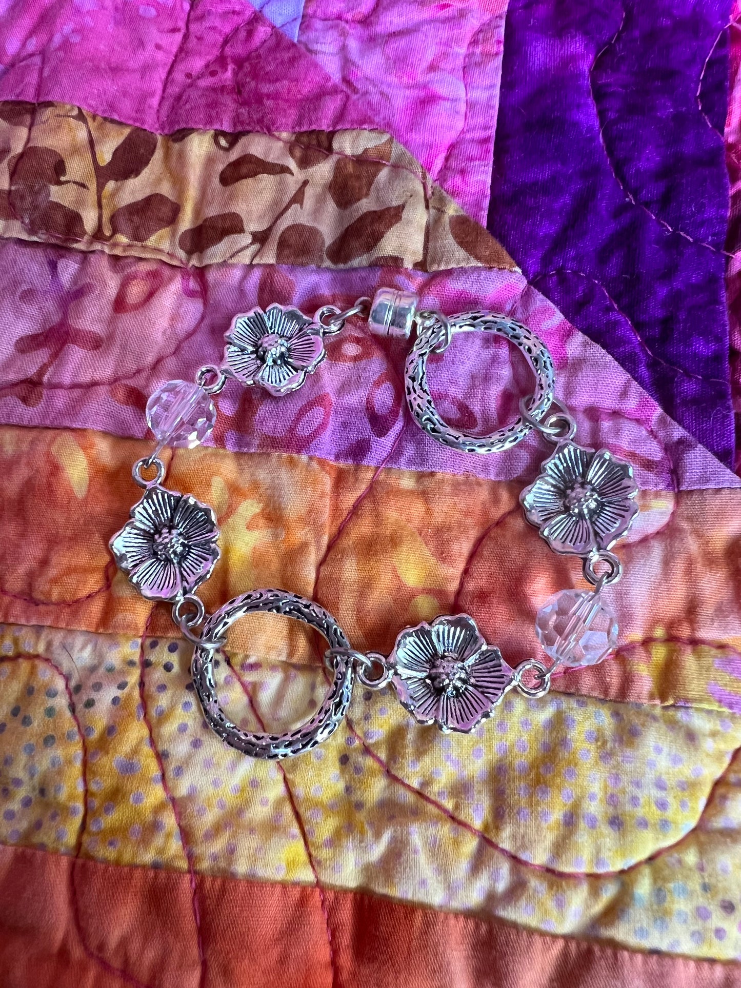 Bracelet- Silver plated metal beads with clear crystal beads.