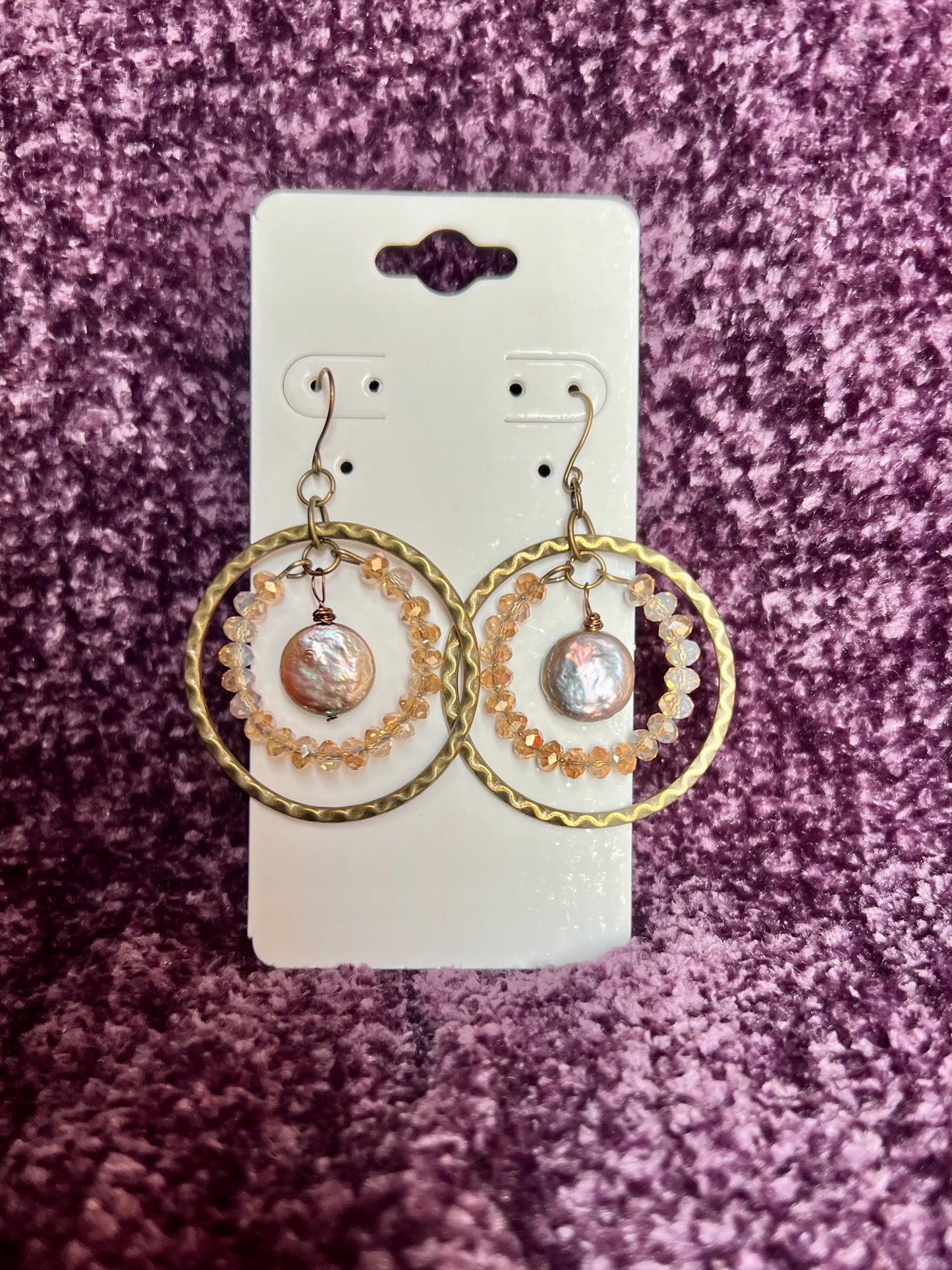 Earrings- Antique gold plated metal with crystals and freshwater coin pearl.