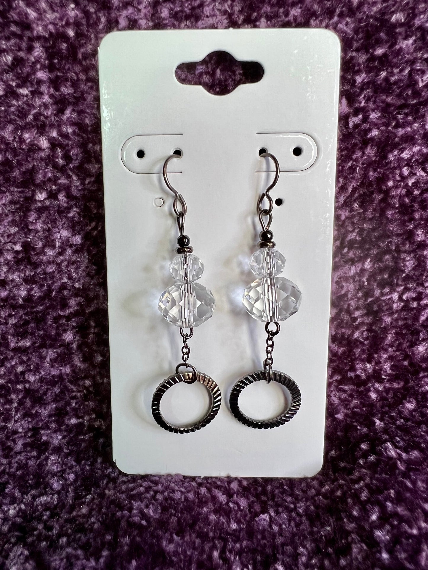 Earrings- Titanium ear hooks, gunmetal plated metal and clear crystals.