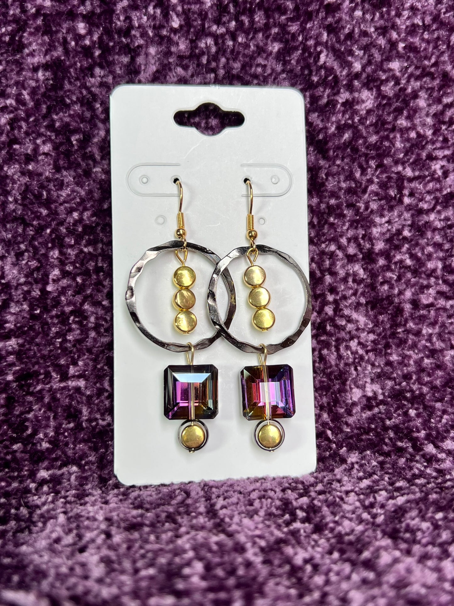 Earrings- Gold plated stainless steel ear hooks, gunmetal and gold plated metal with iridescent crystal.