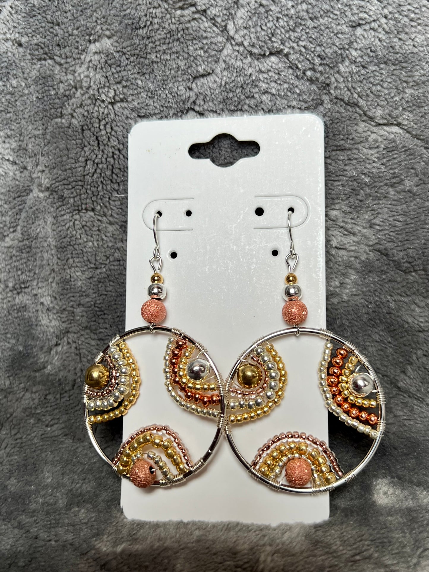 Earrings- Silver plated hoops & wires with silver, gold, and copper plated beads.