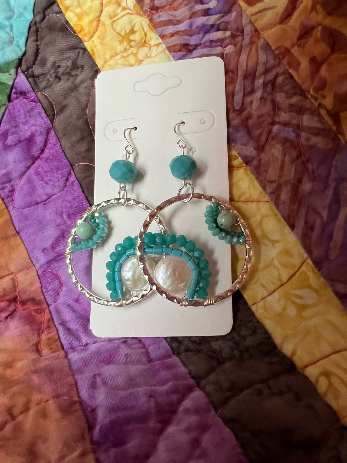 Earrings- Silver plated metal with turquoise pearls, coin pearls, and crystals.