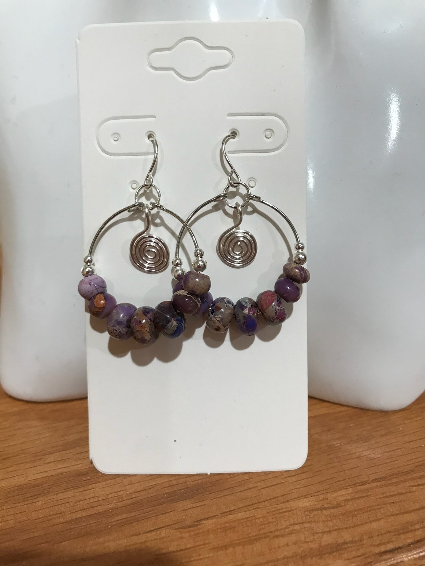 Earrings- Silver plated metal and purple stone beads.