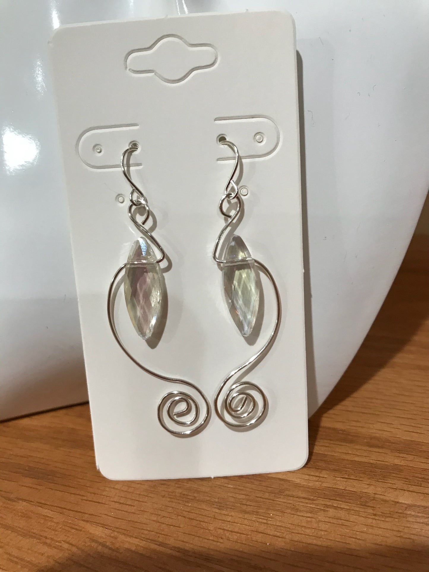 Earrings- Spiral shaped wire with marquise shaped crystal.