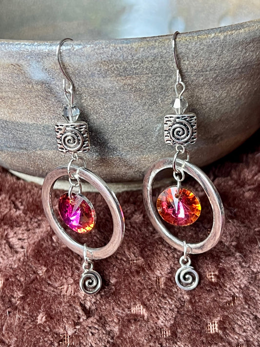 Earrings- Antiqued silver plated metal with silver coated clear crystal bicones and silver foiled iridescent pink/orange crystal beads.