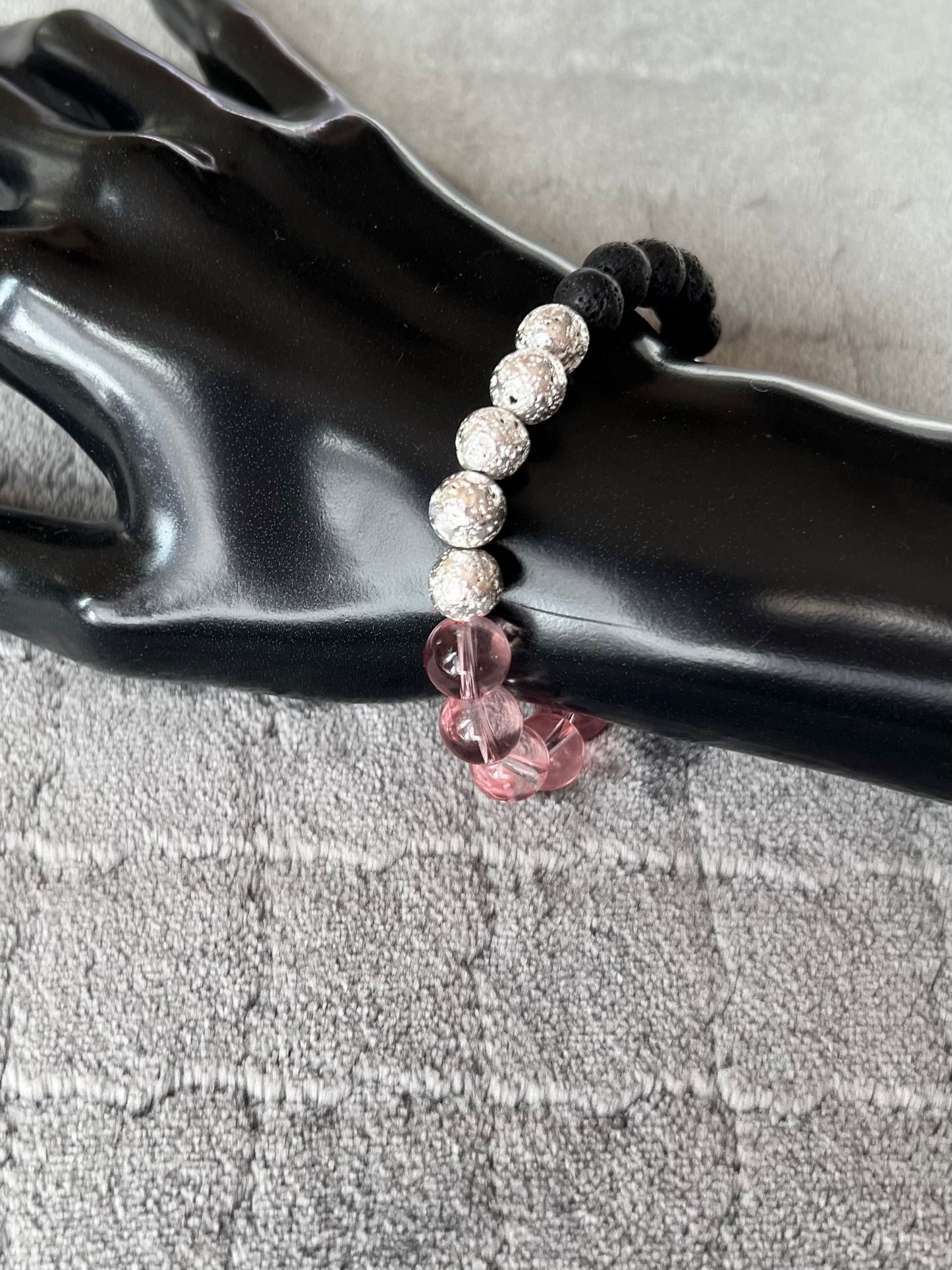 Bracelet- pink glass, silver coated lava beads, and black lava stone beads for essential oils.