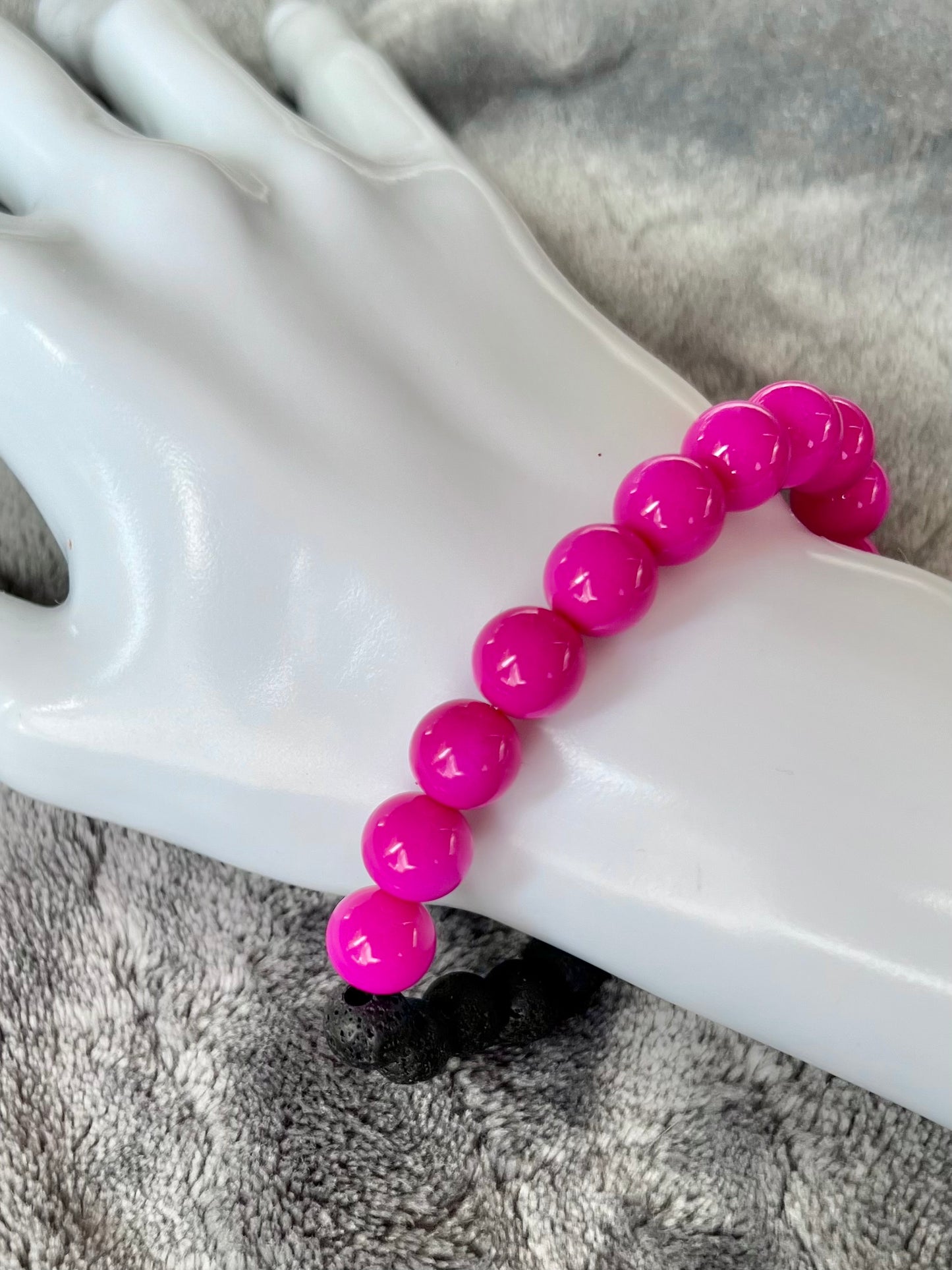 Bracelet- pink beads with black lava stone beads for essential oils.