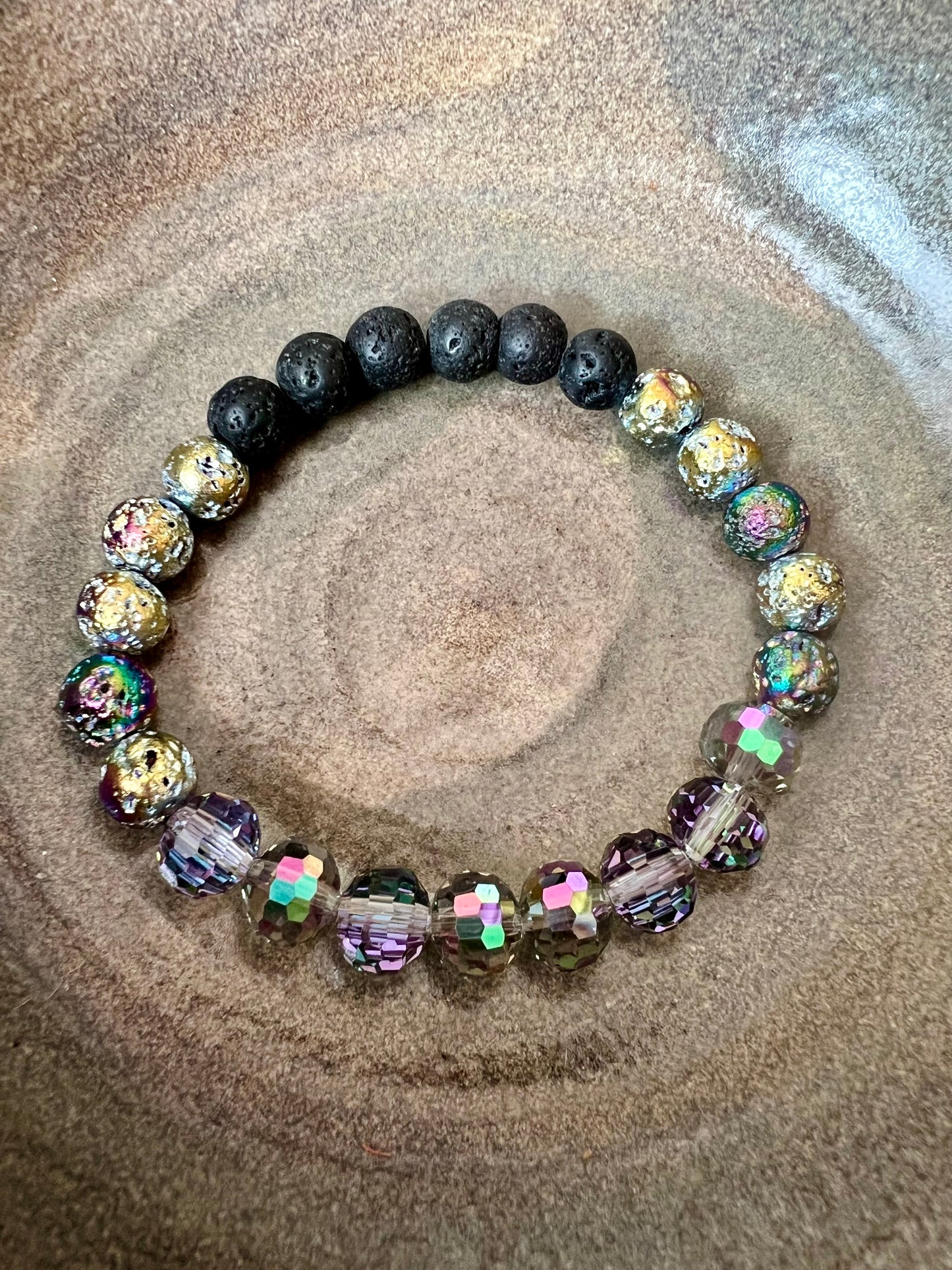 Bracelet- rainbow coated lava beads, round faceted AB crystals, with black lava stone beads for essential oils.