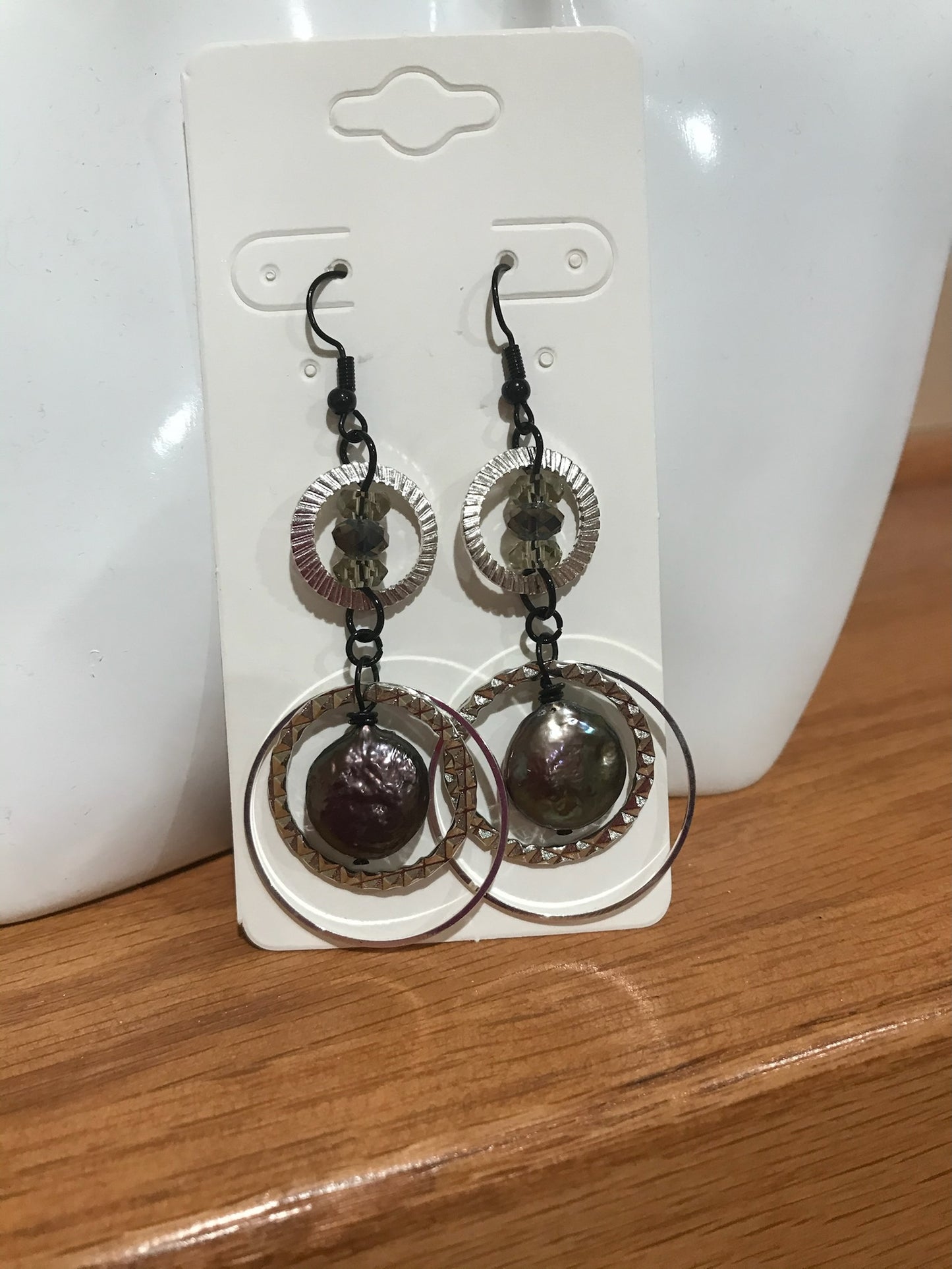 Earrings- Silver plated metal hoops with crystals & freshwater peacock coin pearls.