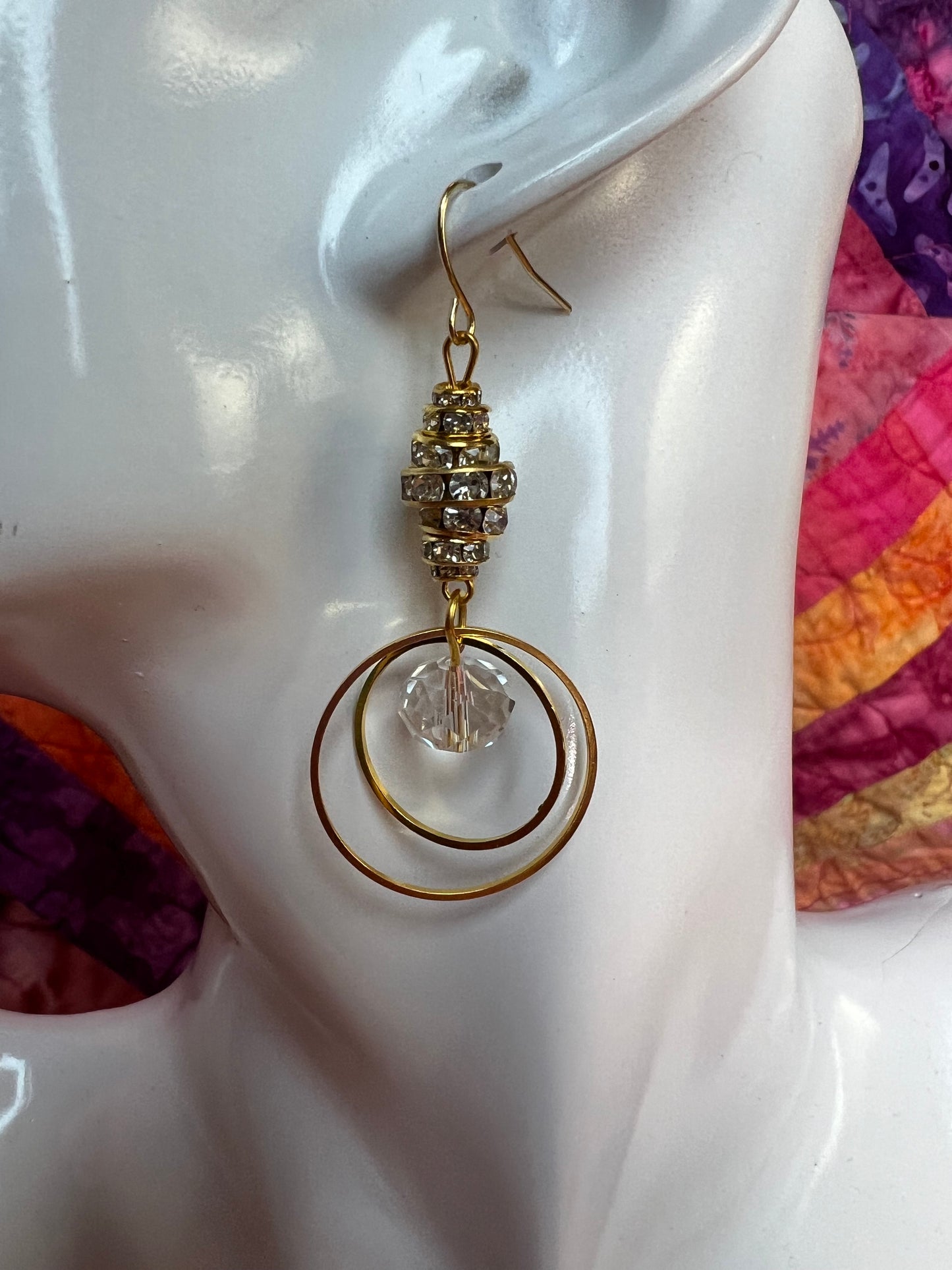 Earrings- Gold plated metal with clear crystal & rondelles.