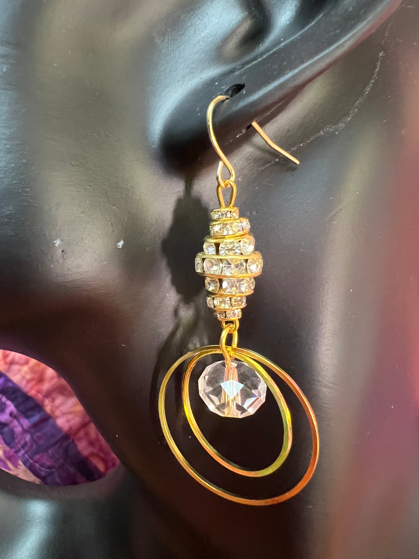 Earrings- Gold plated metal with clear crystal & rondelles.