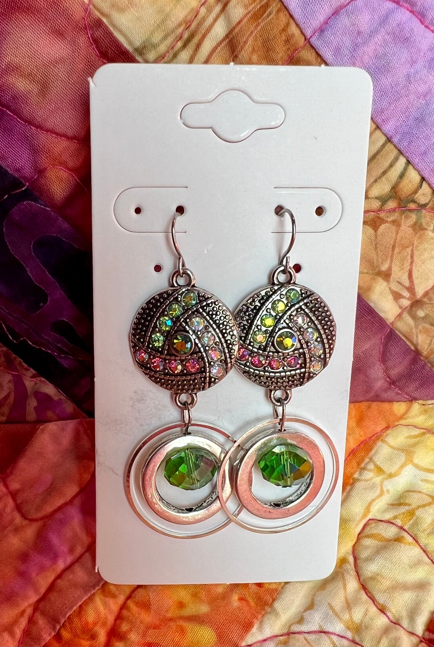 Earrings- Antiqued silver plated metal with green and coral AB crystal rhinestones.