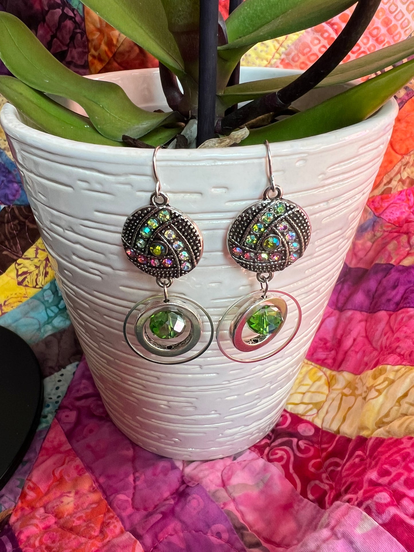 Earrings- Antiqued silver plated metal with green and coral AB crystal rhinestones.