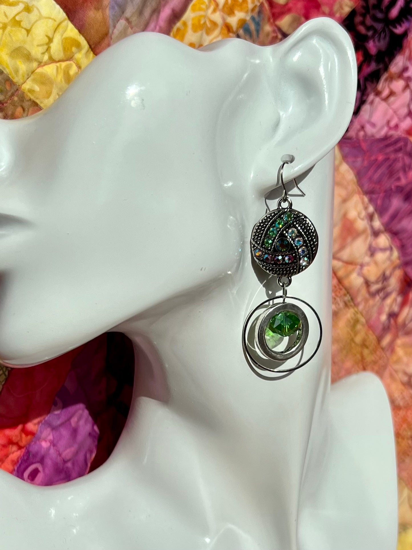 Earrings- Antiqued silver plated metal with green and coral AB crystal rhinestones.