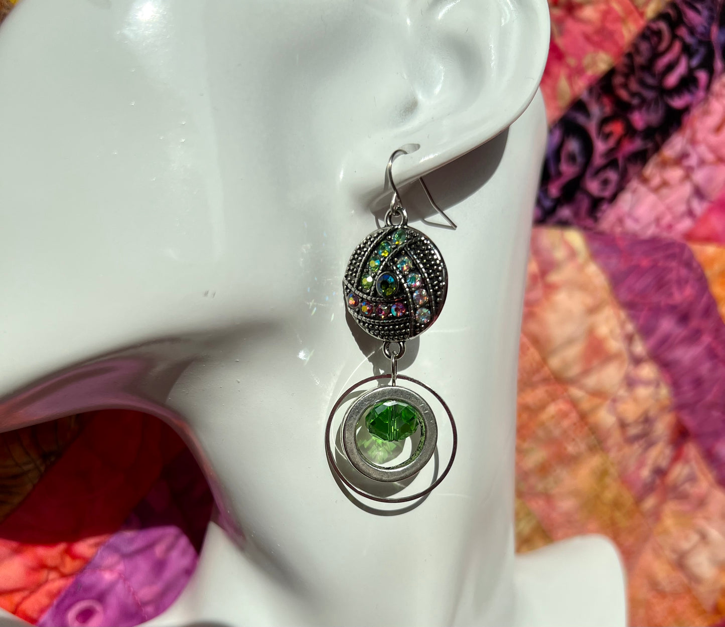 Earrings- Antiqued silver plated metal with green and coral AB crystal rhinestones.