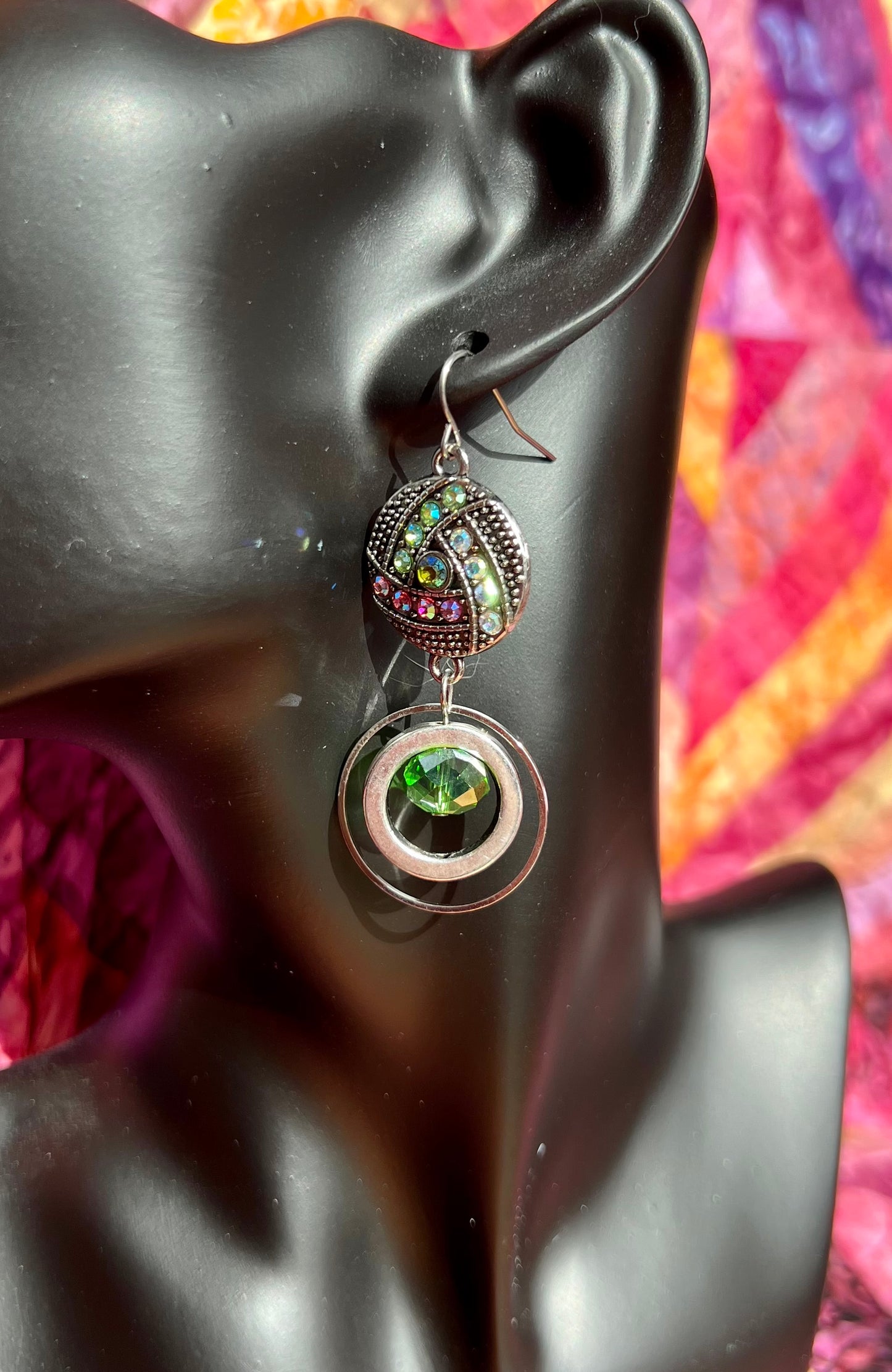 Earrings- Antiqued silver plated metal with green and coral AB crystal rhinestones.