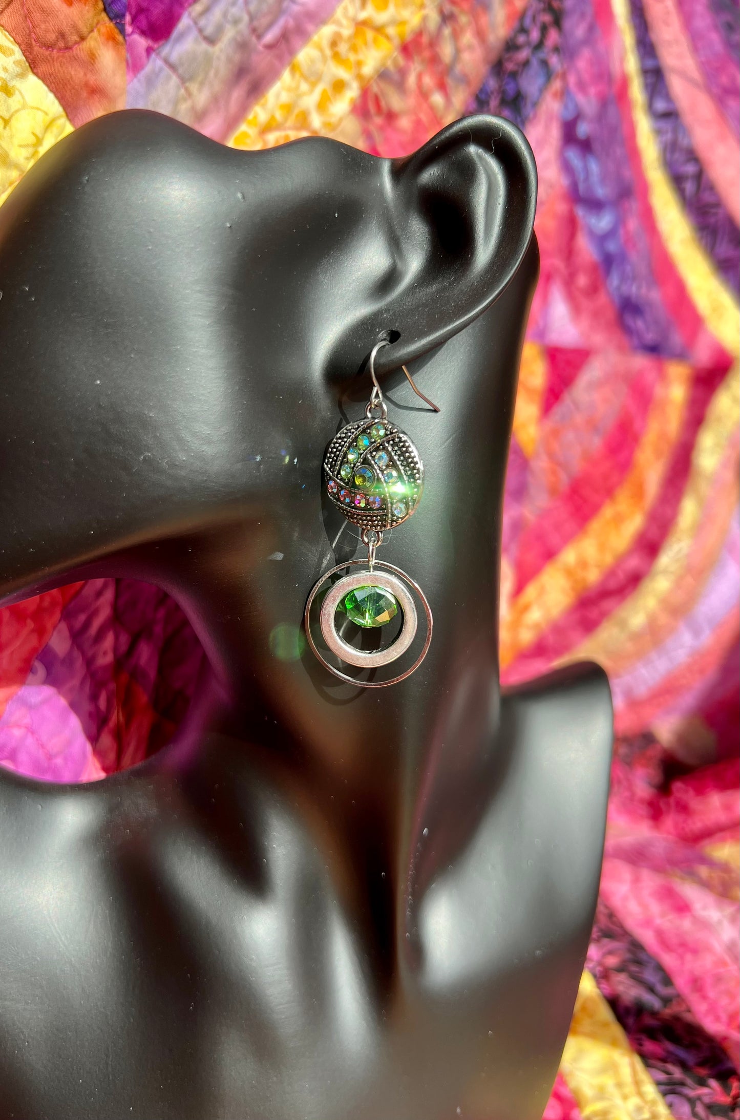 Earrings- Antiqued silver plated metal with green and coral AB crystal rhinestones.