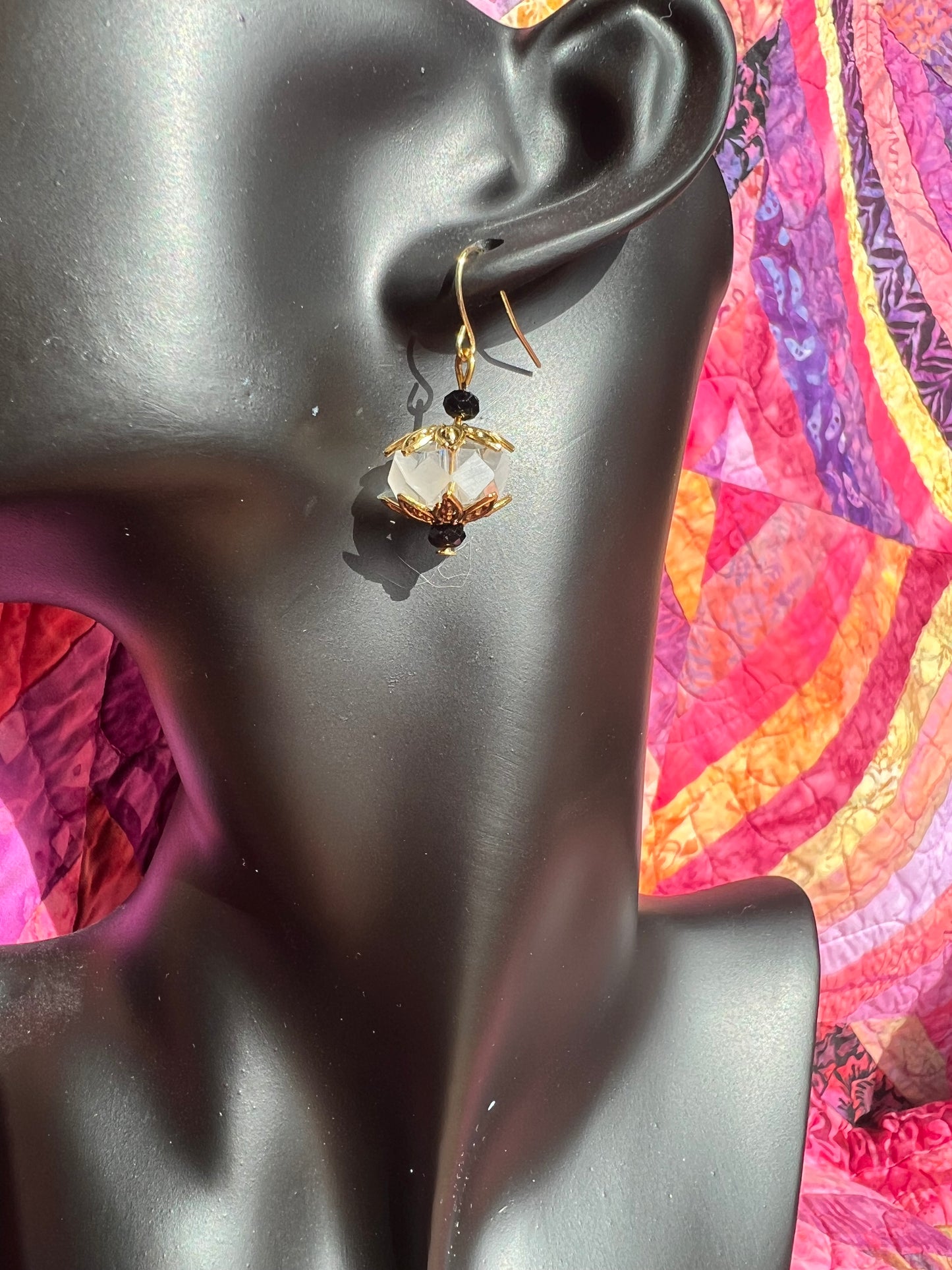 Earrings- Gold plated metal with black and clear crystals.