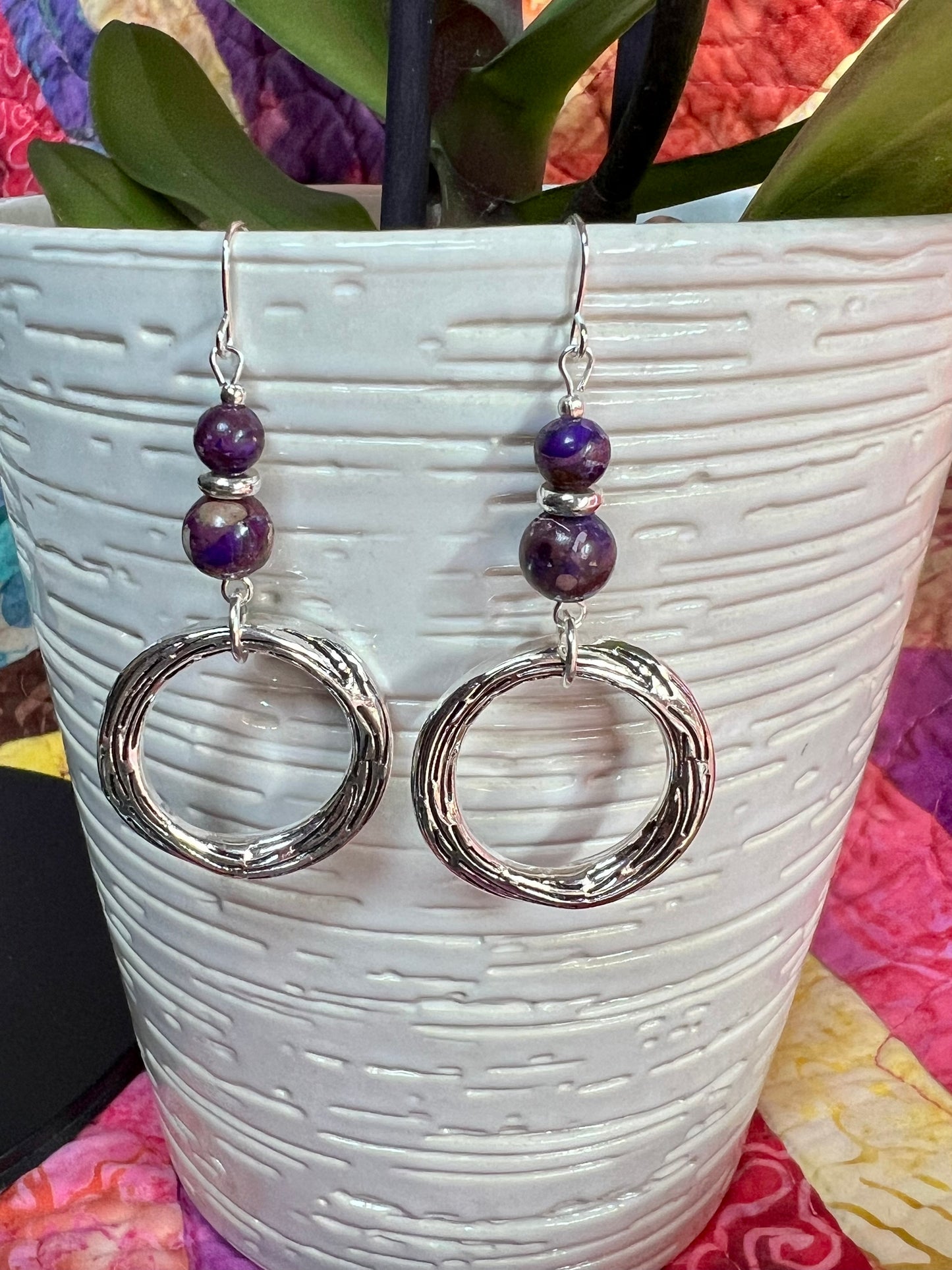 Earrings- Silver plated metal with purple dyed natural stone beads.