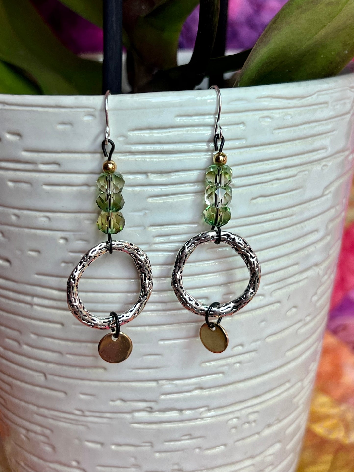 Earrings- Silver plated metal ear hooks and circle rings, with black metal and crystals. Multiple colors available.