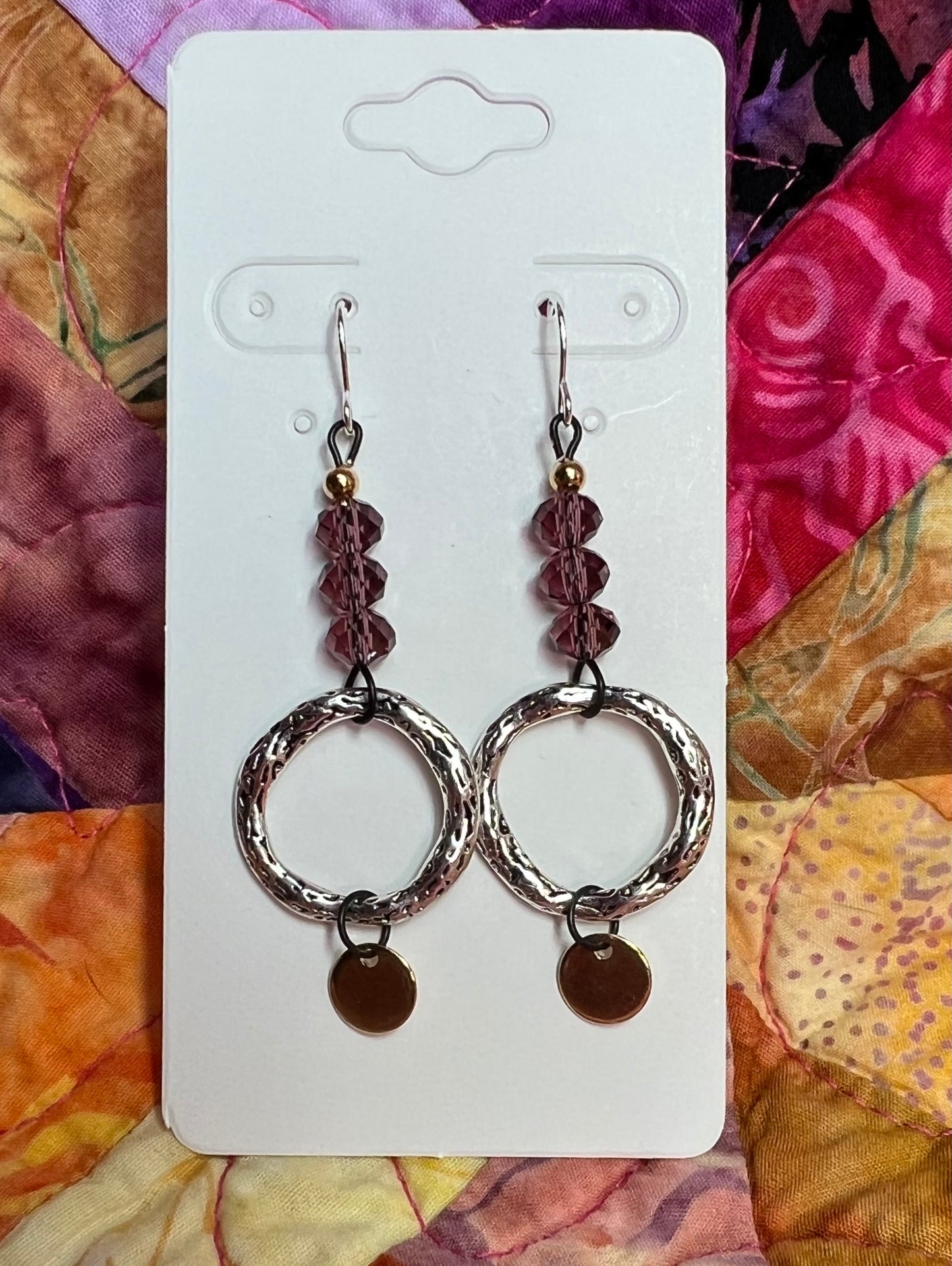 Earrings- Silver plated metal ear hooks and circle rings, with black metal and crystals. Multiple colors available.