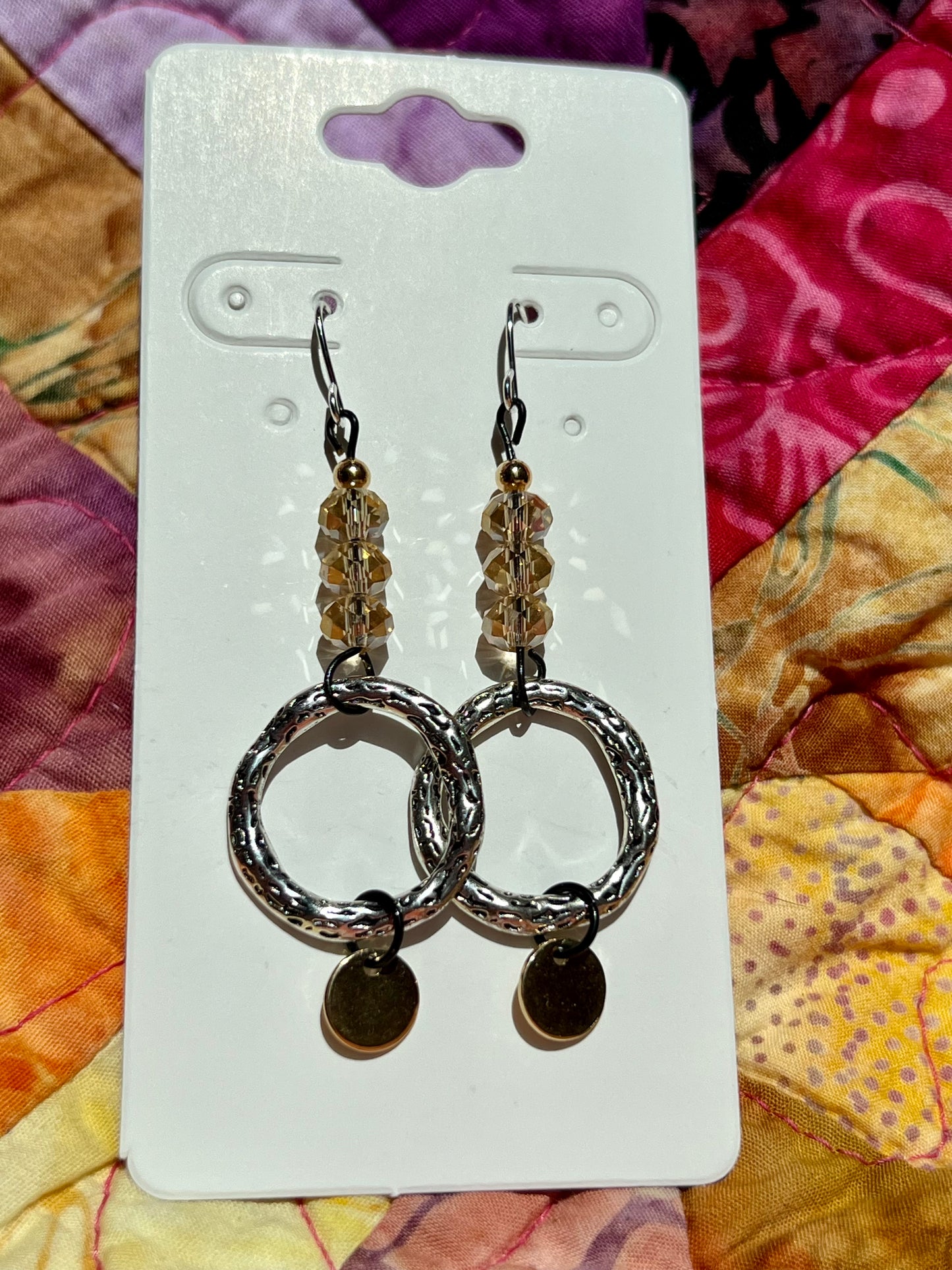 Earrings- Silver plated metal ear hooks and circle rings, with black metal and crystals. Multiple colors available.