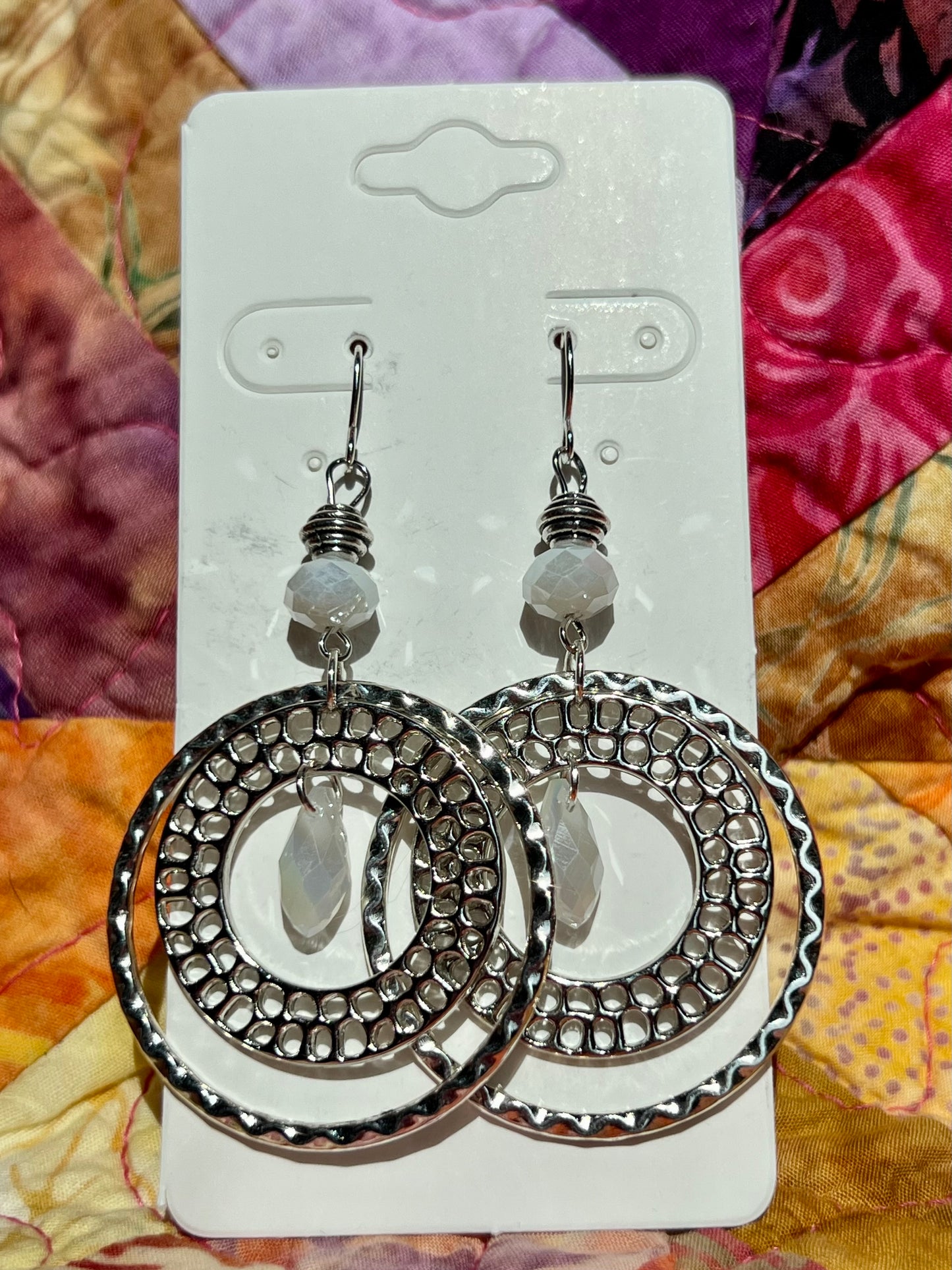 Earrings- Silver plated metal with opaque white Chinese crystal beads.