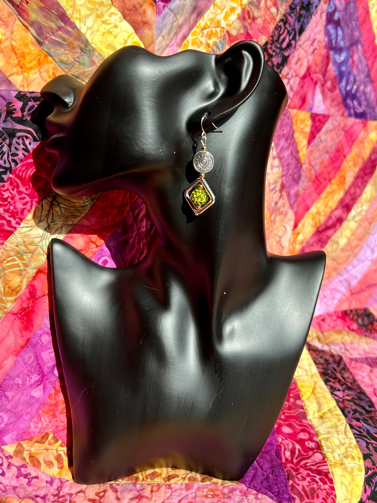 Earrings- Stainless steel ear hooks, antiqued silver plated and gold plated metal beads with lime green clay rhinestone beads.