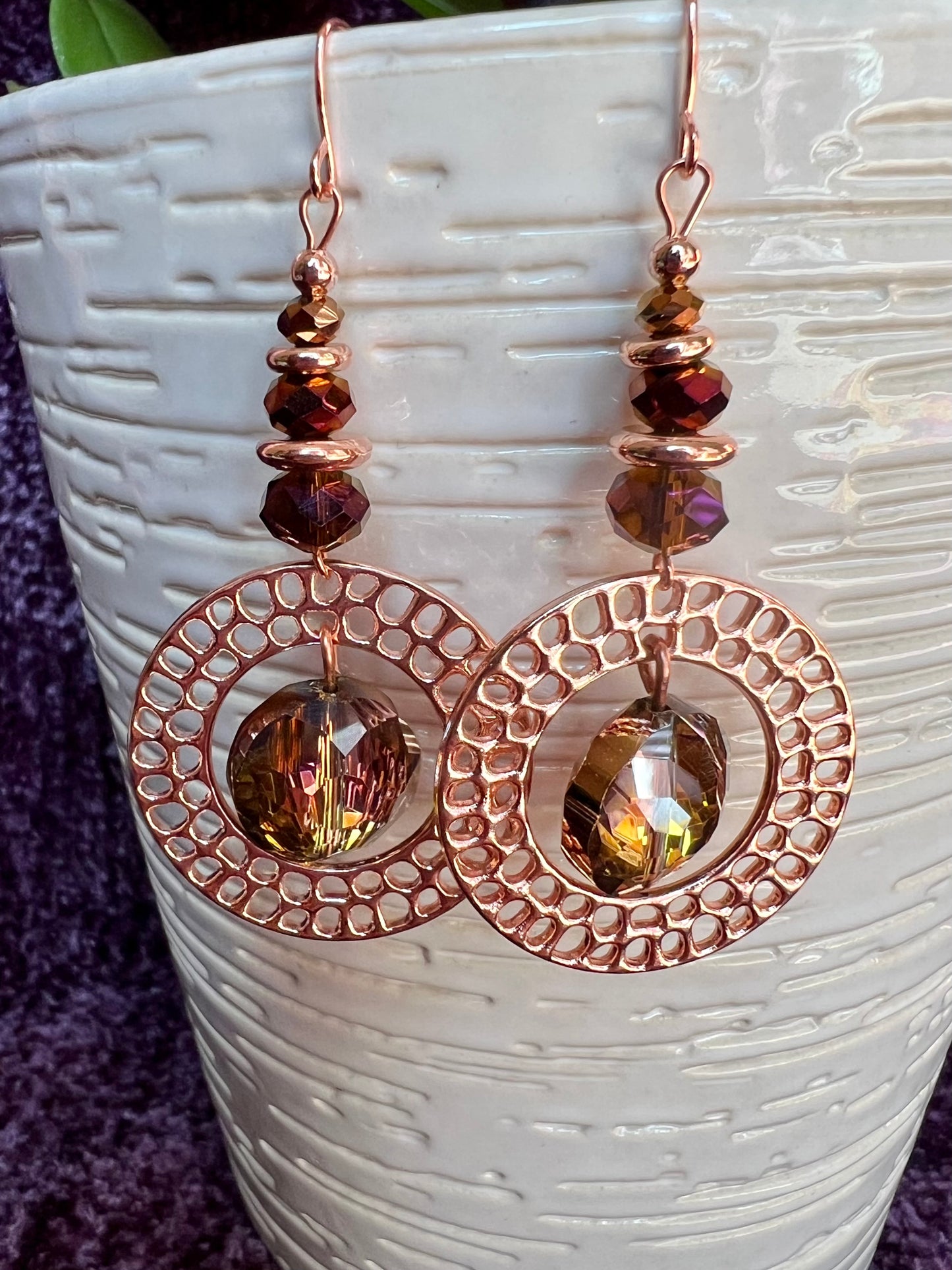 Earrings- Rose gold plated metal with crystal beads.