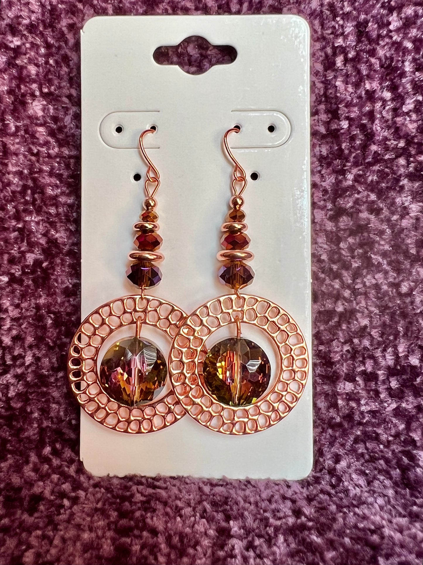 Earrings- Rose gold plated metal with crystal beads.