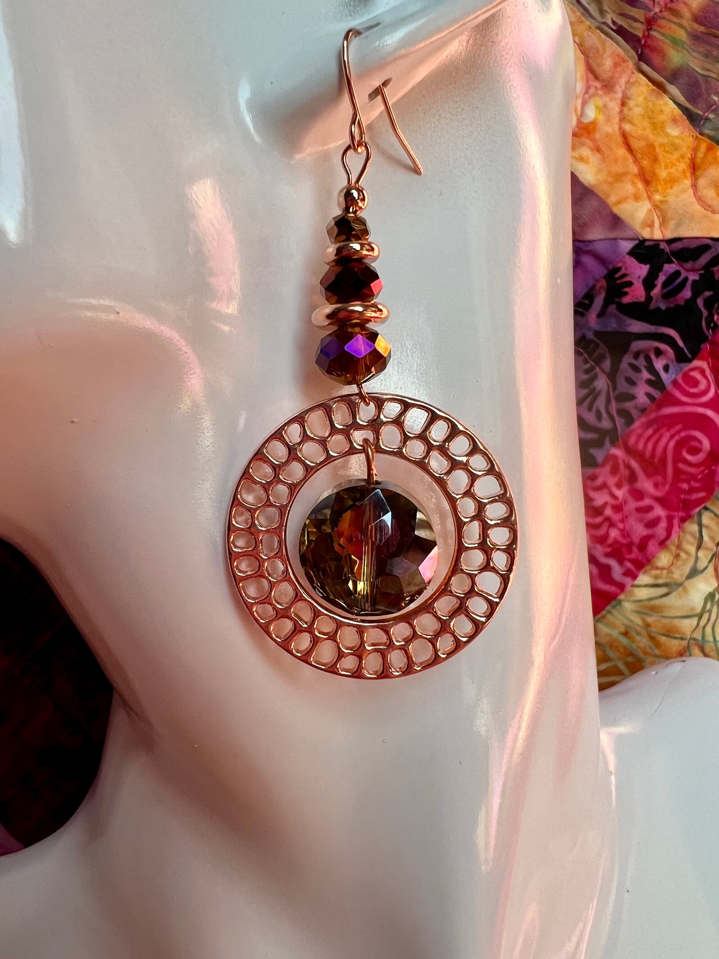 Earrings- Rose gold plated metal with crystal beads.