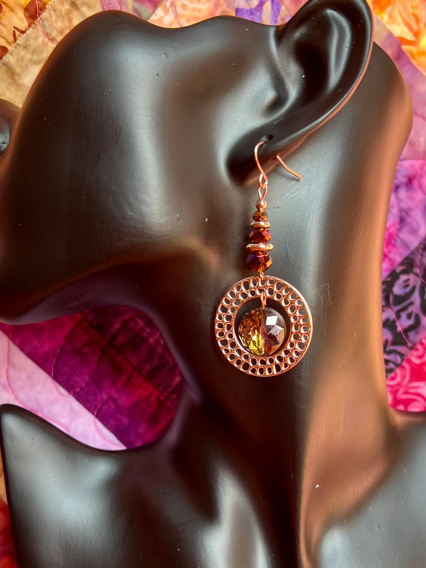 Earrings- Rose gold plated metal with crystal beads.