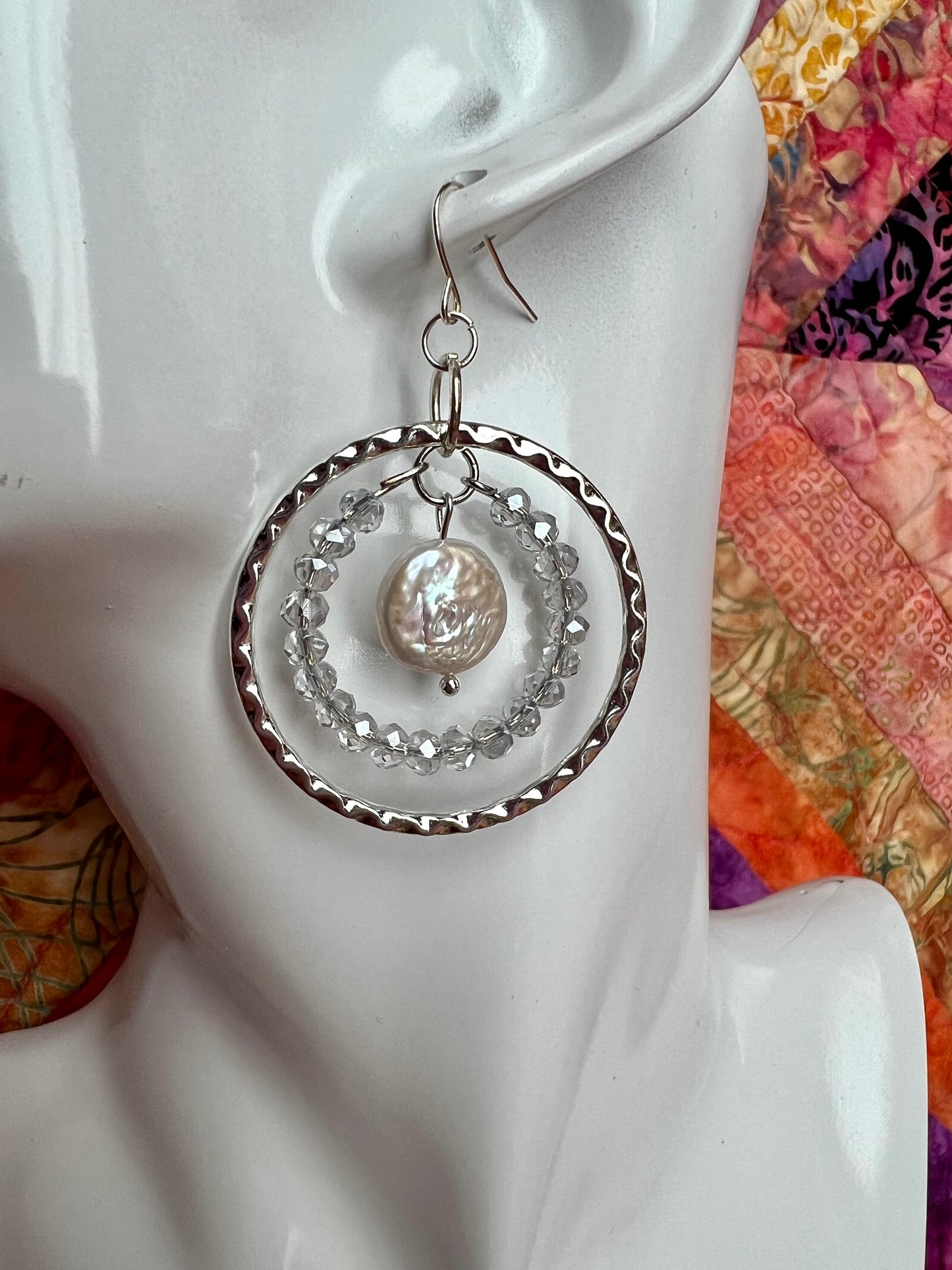 Earrings- Silver plated metal with silvery crystals and white freshwater coin pearls.