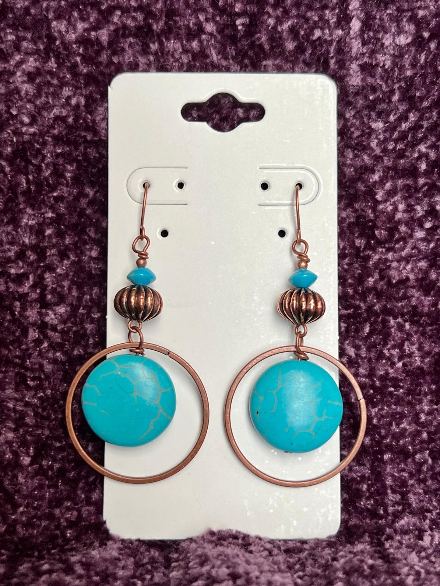 Earrings- Antique copper plated metal with turquoise beads.