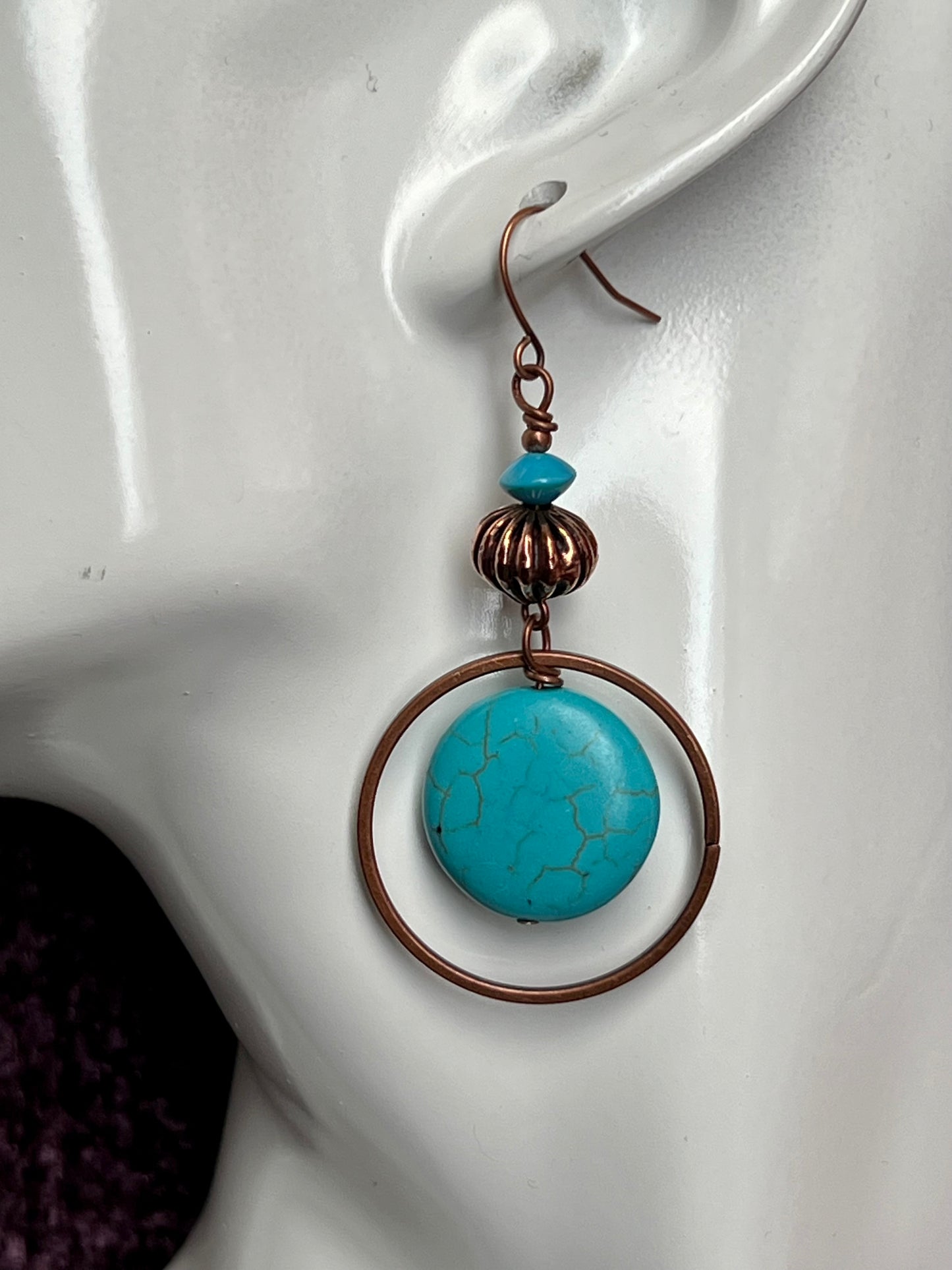 Earrings- Antique copper plated metal with turquoise beads.