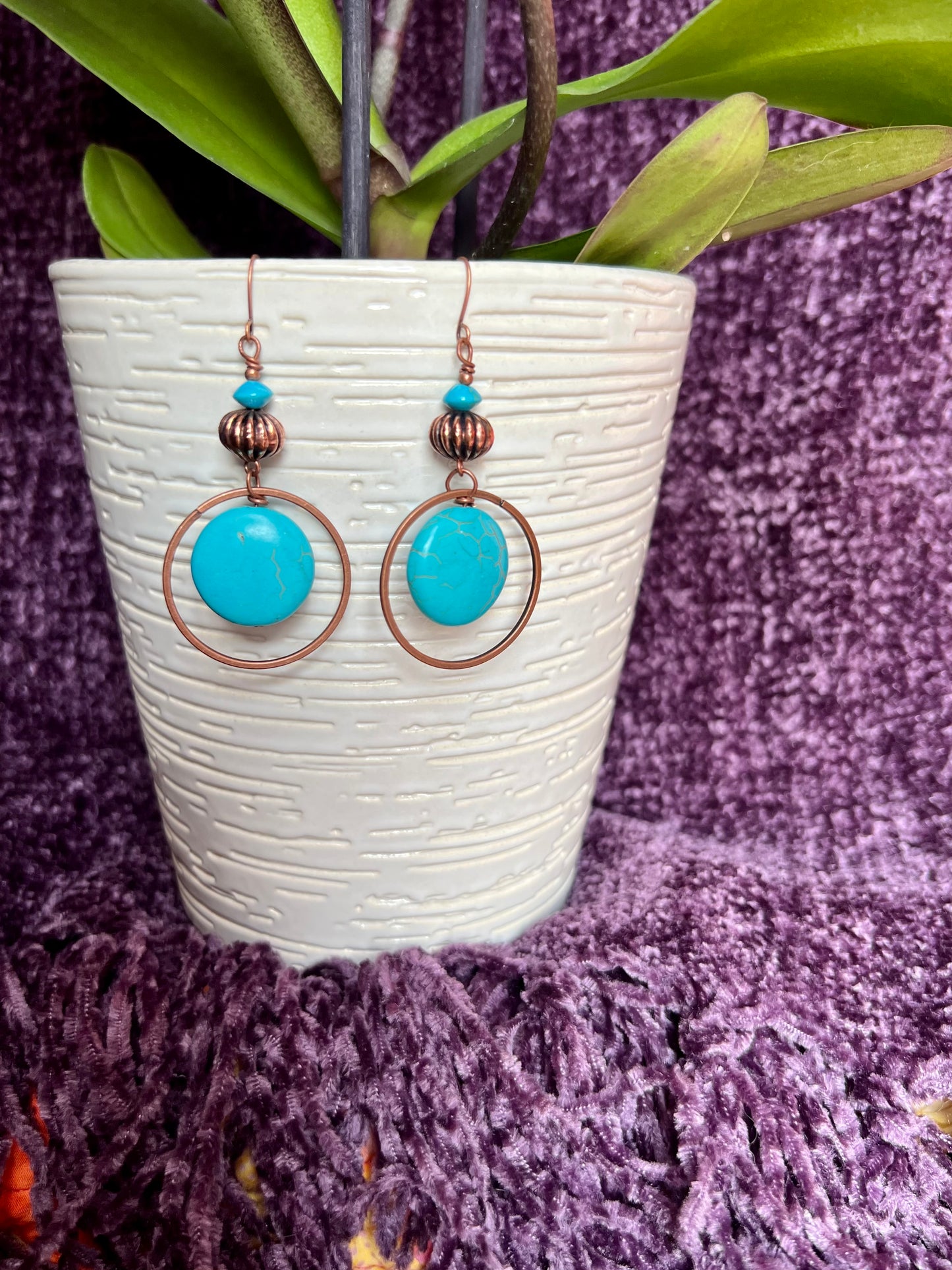 Earrings- Antique copper plated metal with turquoise beads.