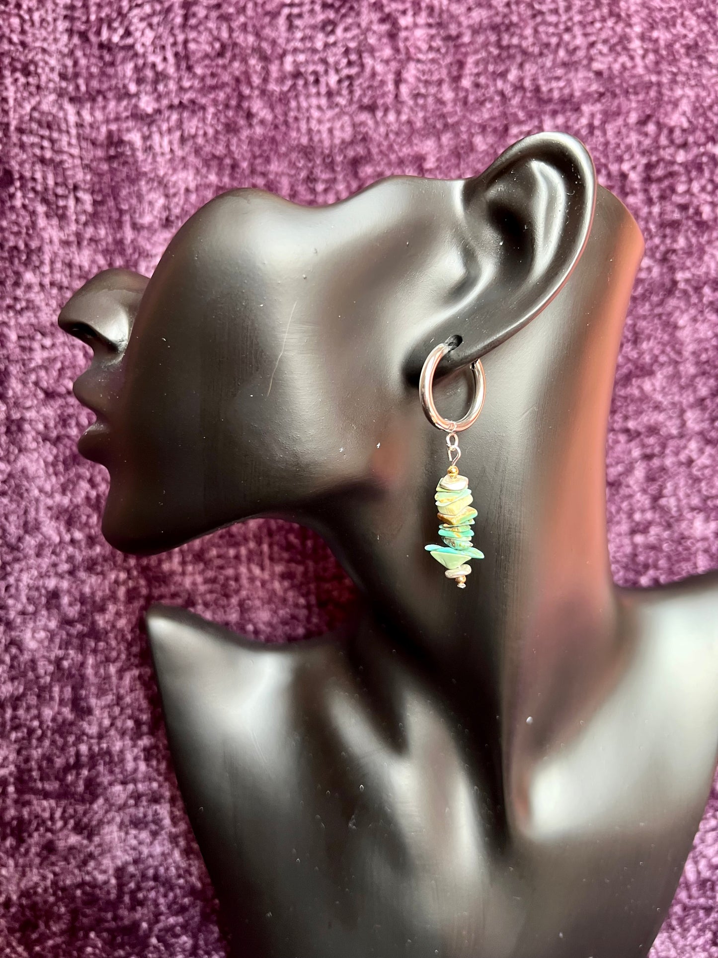 Earrings- Stainless steel huggie earrings with gold and silver plated metal and turquoise chips.