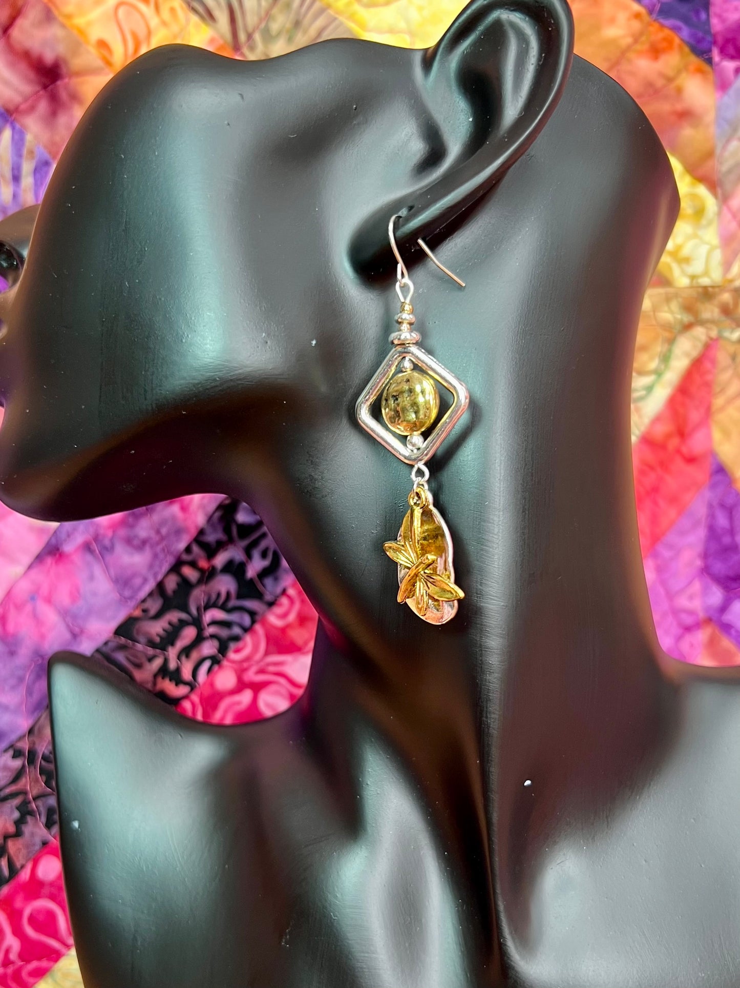 Earrings- Silver and gold plated metal with butterfly charms.