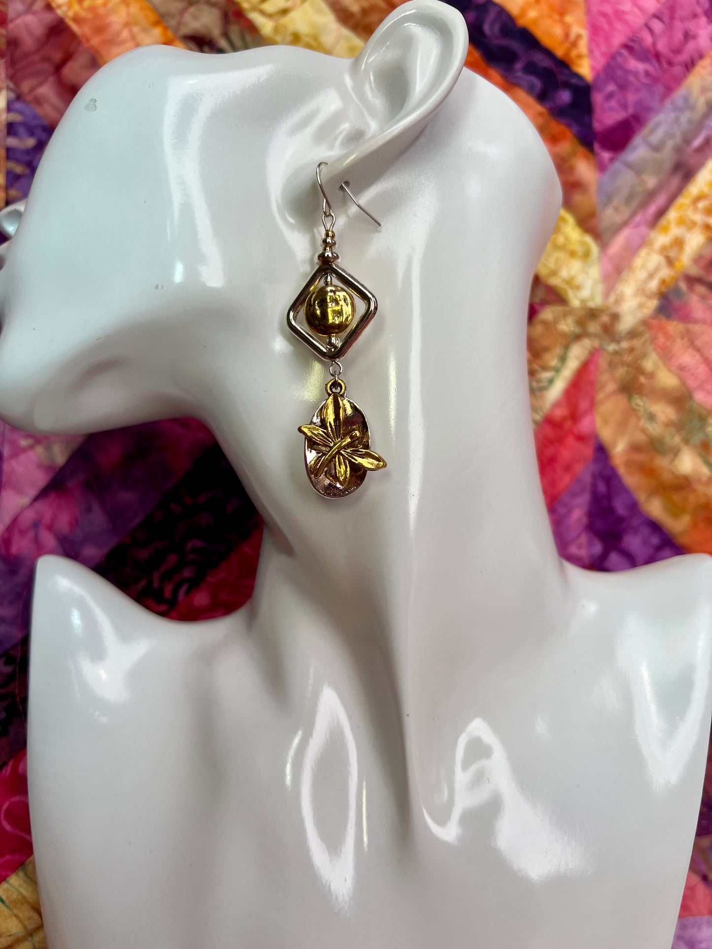 Earrings- Silver and gold plated metal with butterfly charms.