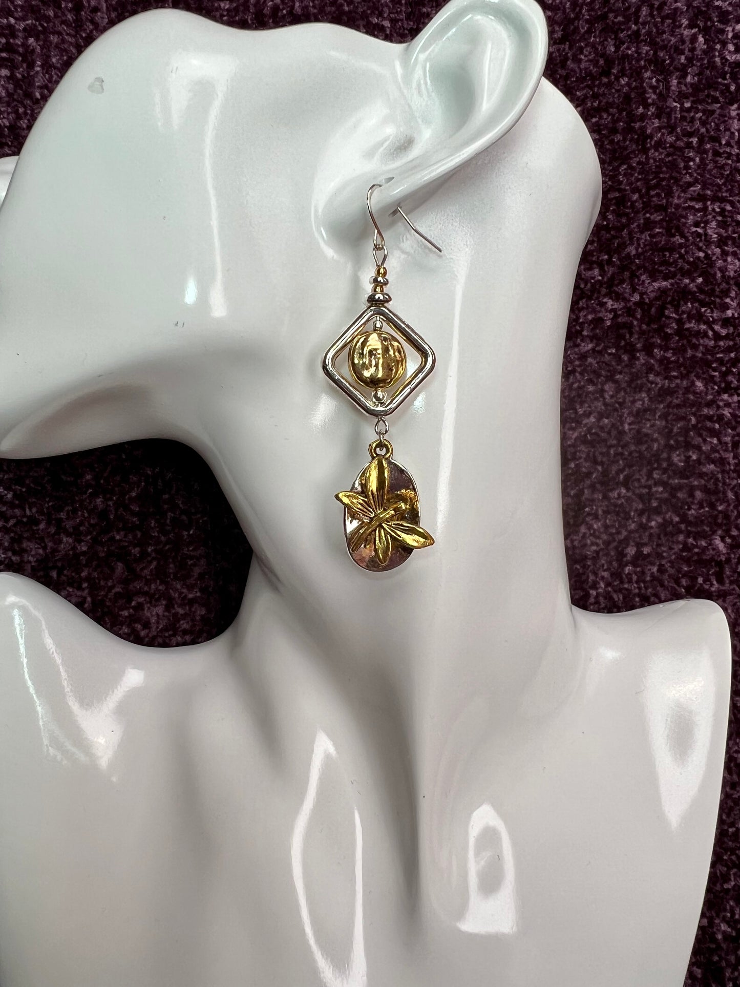 Earrings- Silver and gold plated metal with butterfly charms.