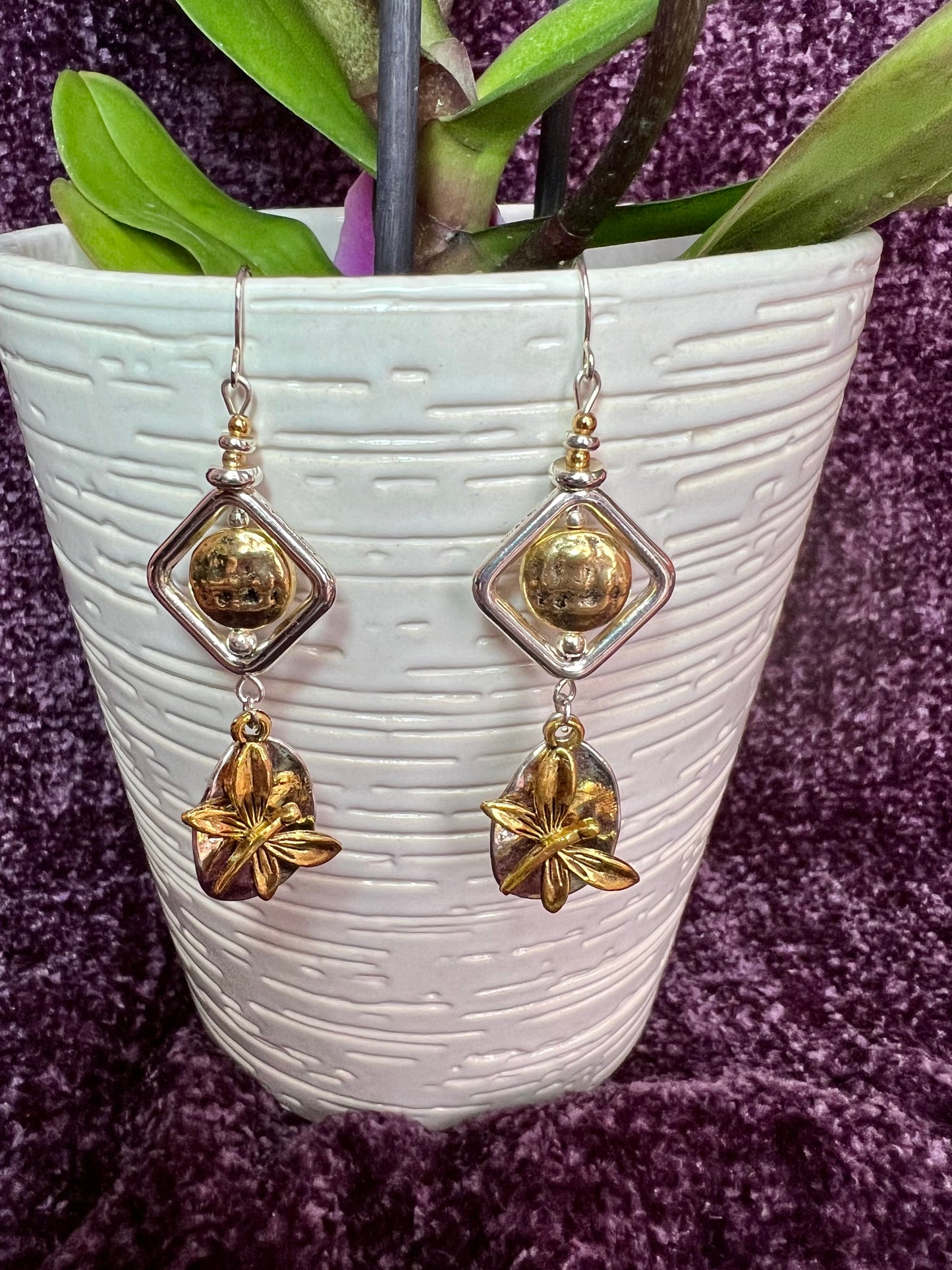 Earrings- Silver and gold plated metal with butterfly charms.