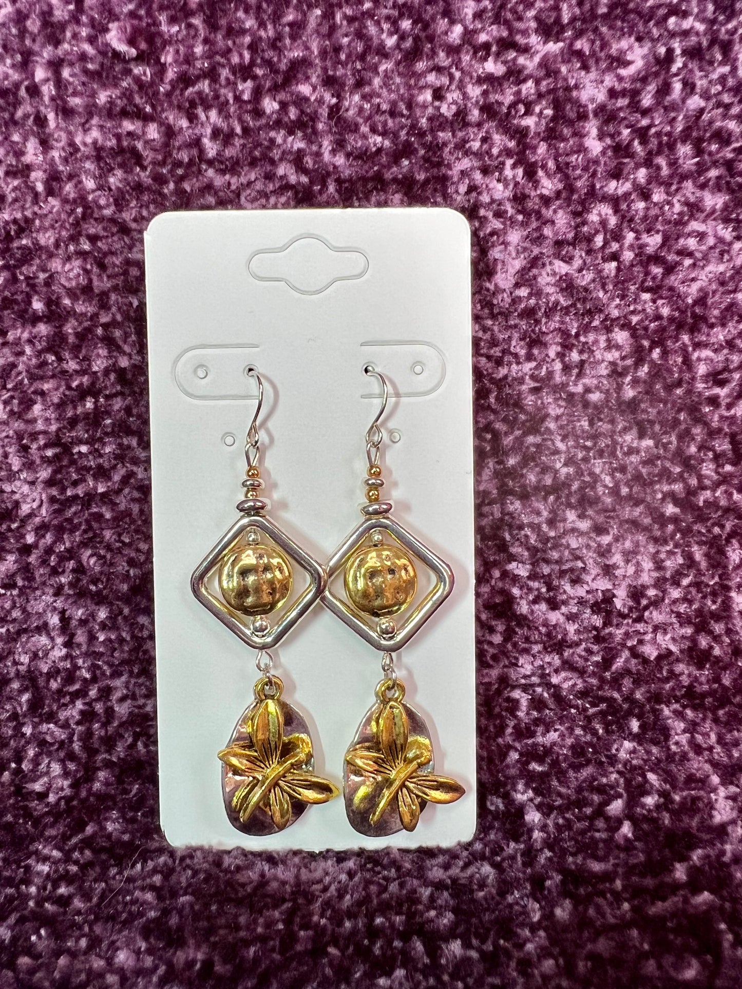 Earrings- Silver and gold plated metal with butterfly charms.