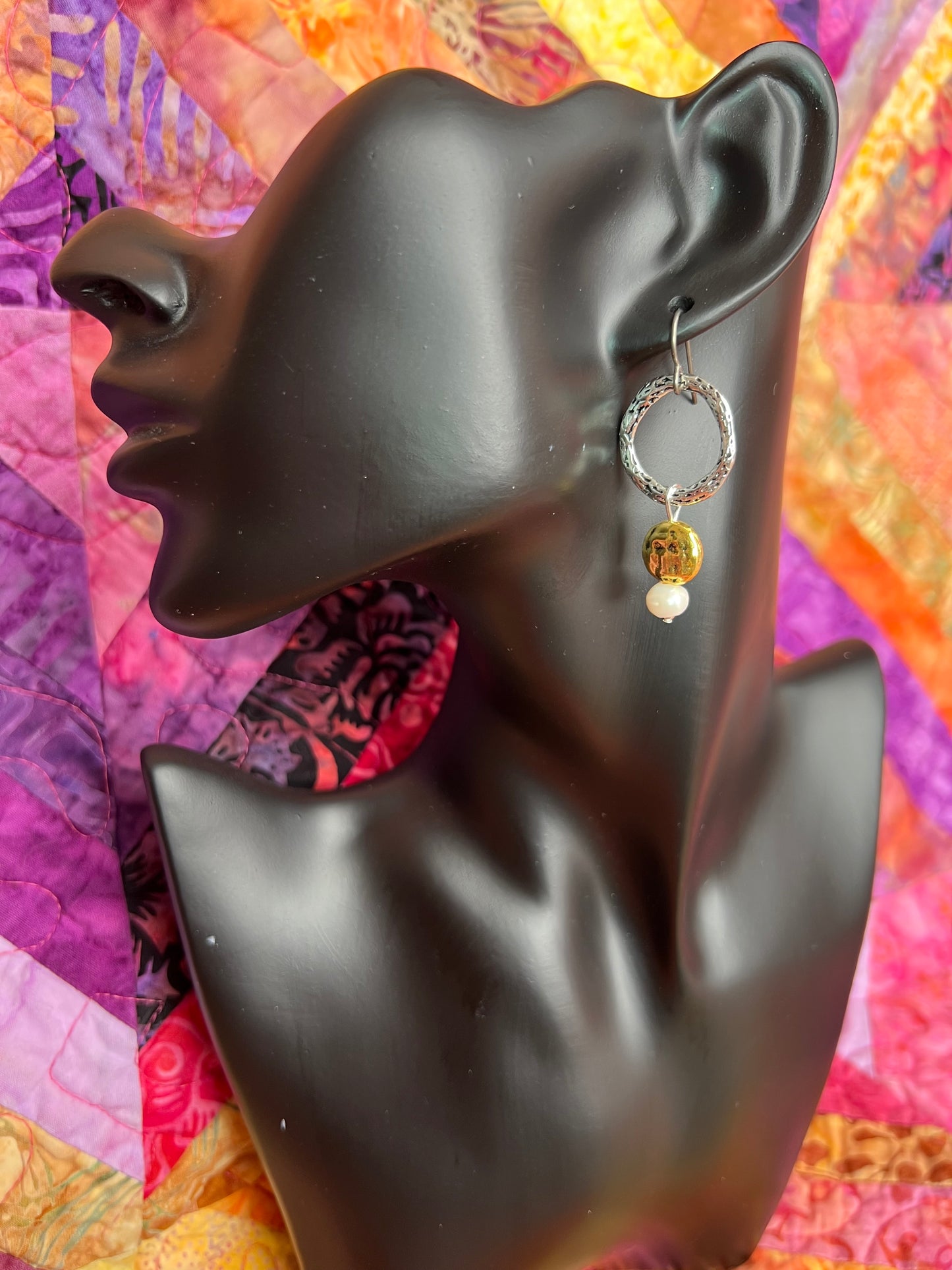 Earrings- Titanium ear hooks, silver and gold plated metal with genuine white freshwater pearls. Asymmetrical.