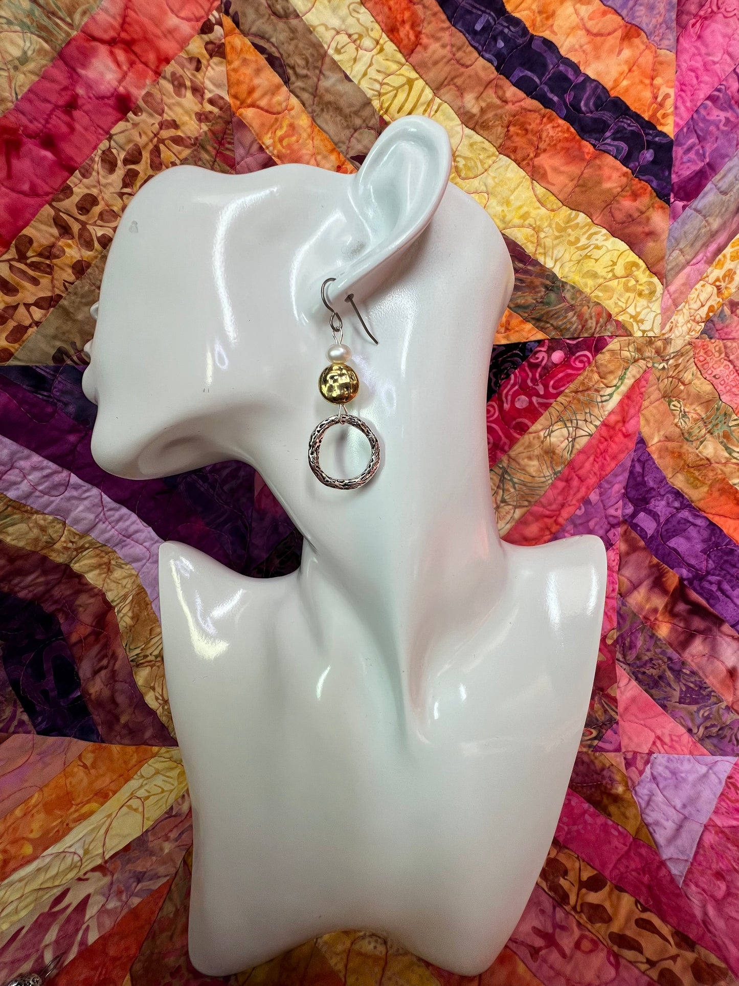 Earrings- Titanium ear hooks, silver and gold plated metal with genuine white freshwater pearls. Asymmetrical.