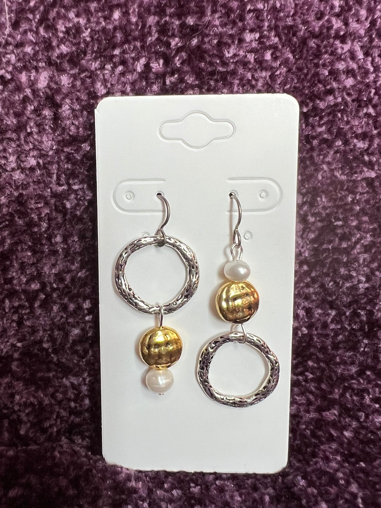 Earrings- Titanium ear hooks, silver and gold plated metal with genuine white freshwater pearls. Asymmetrical.