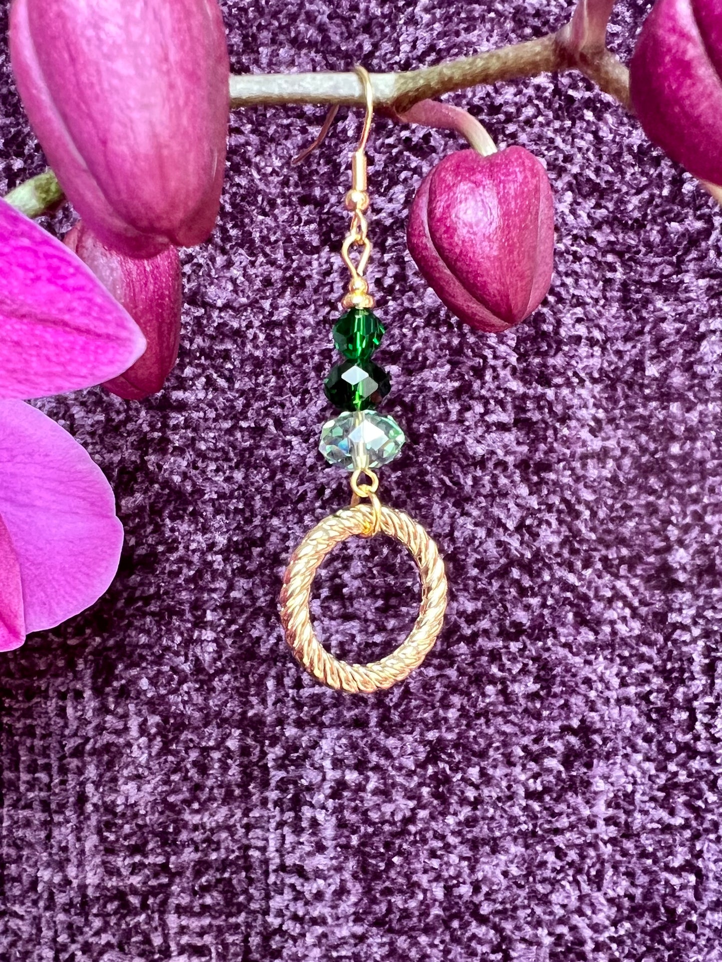 Earrings- Gold plated stainless steel ear hooks, gold plated metal with various green colored crystals.