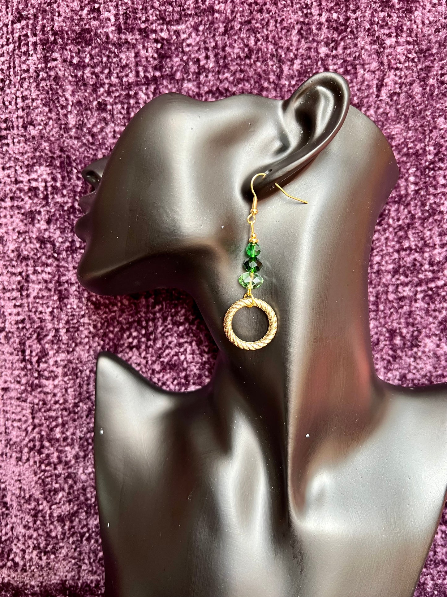 Earrings- Gold plated stainless steel ear hooks, gold plated metal with various green colored crystals.