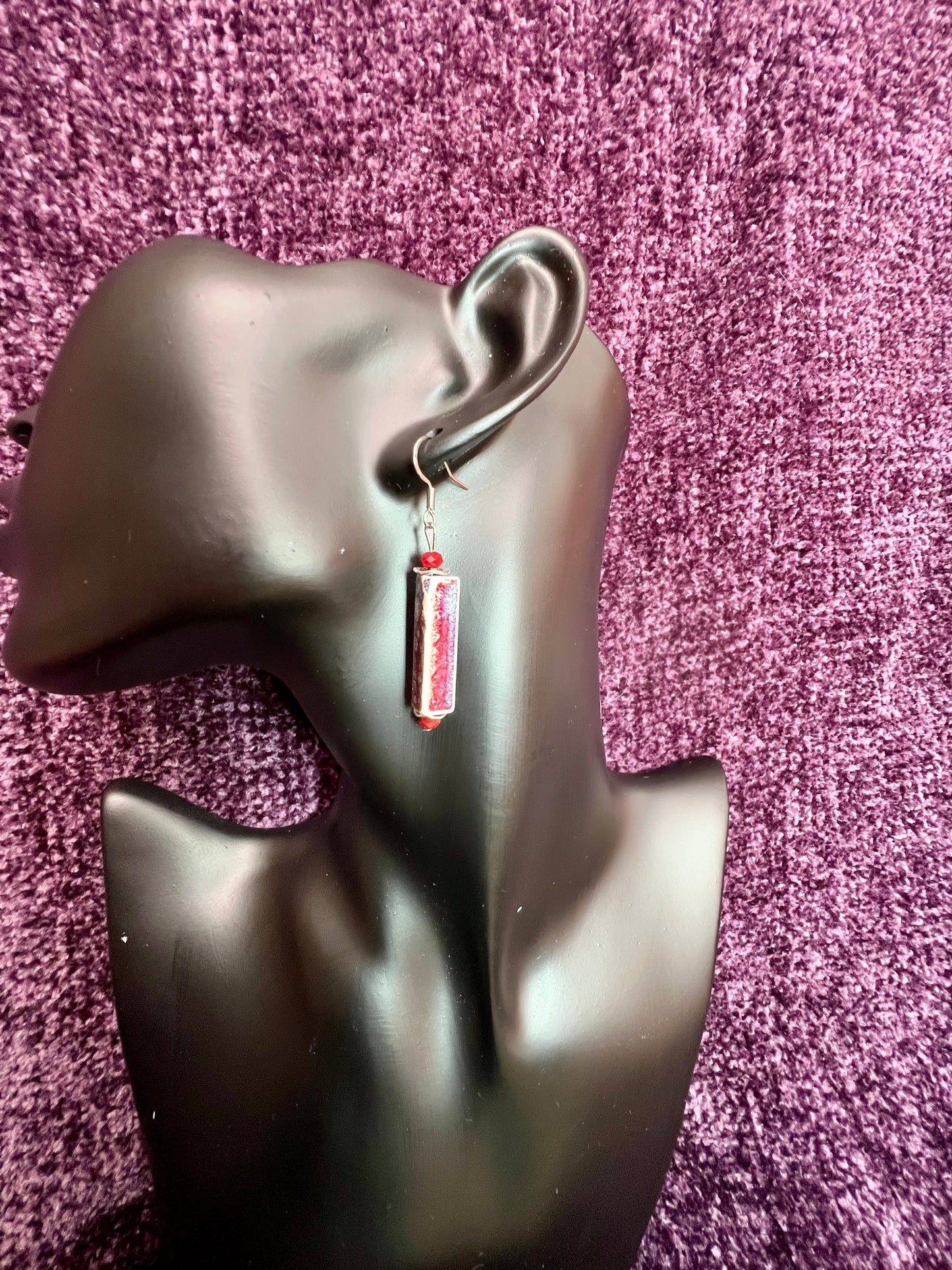 Earrings- Stainless steel ear hooks, red crystals, and ceramic rectangular tube beads in red and blue glaze.