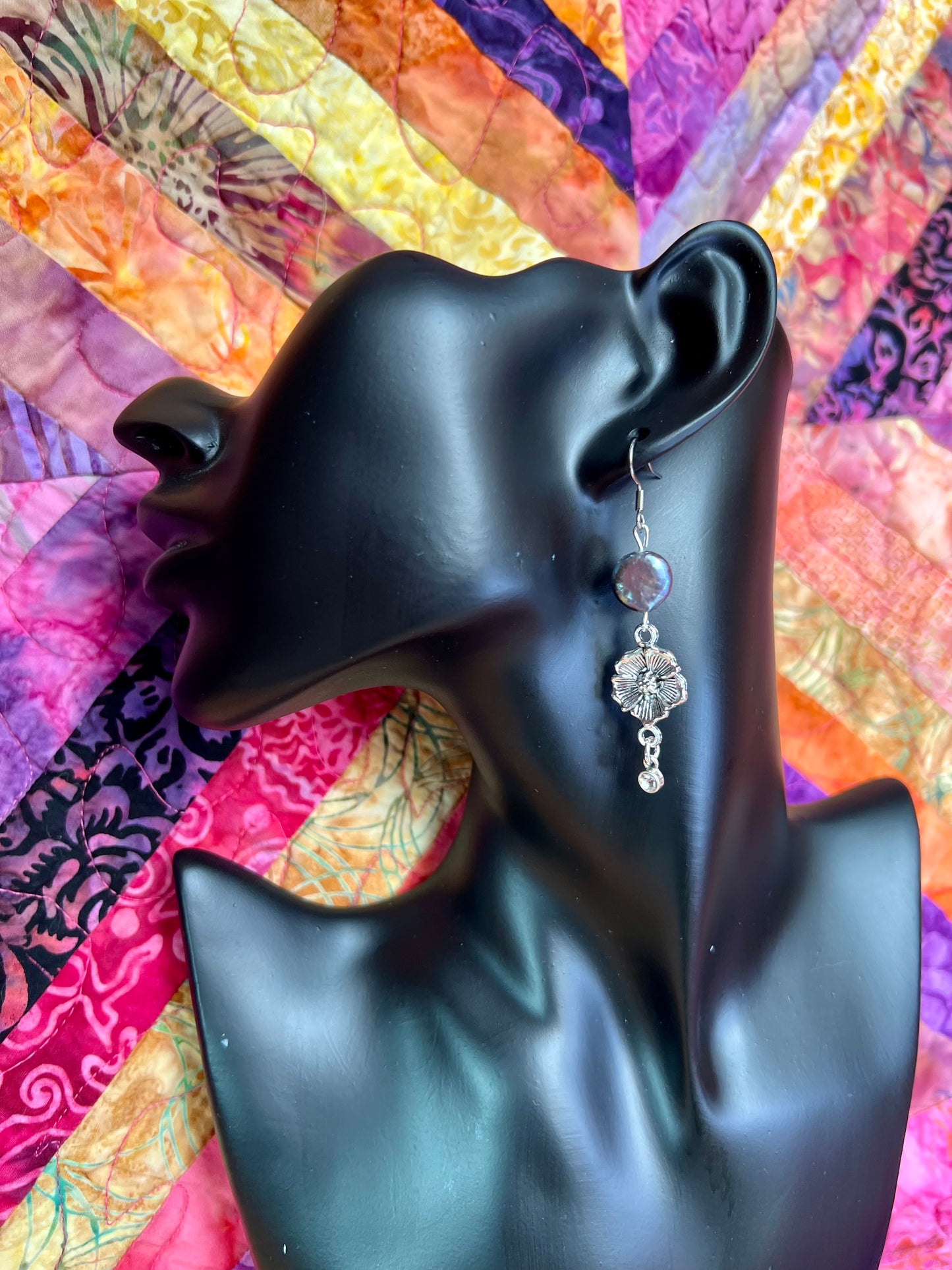 Earrings- Stainless steel ear hooks, silver plated metal with freshwater coin pearls. Asymmetrical.