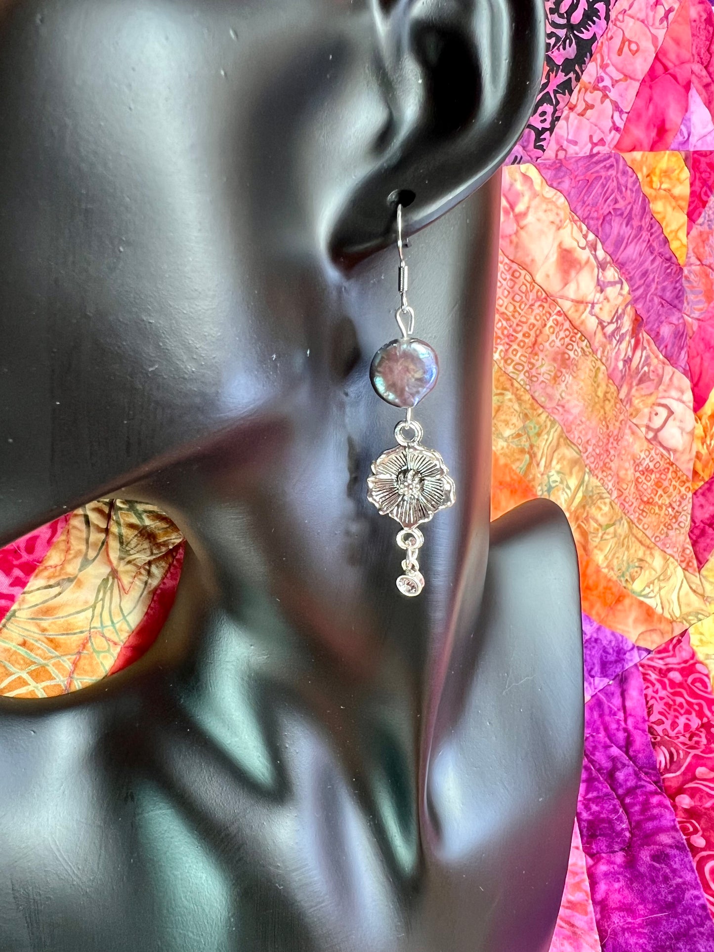 Earrings- Stainless steel ear hooks, silver plated metal with freshwater coin pearls. Asymmetrical.